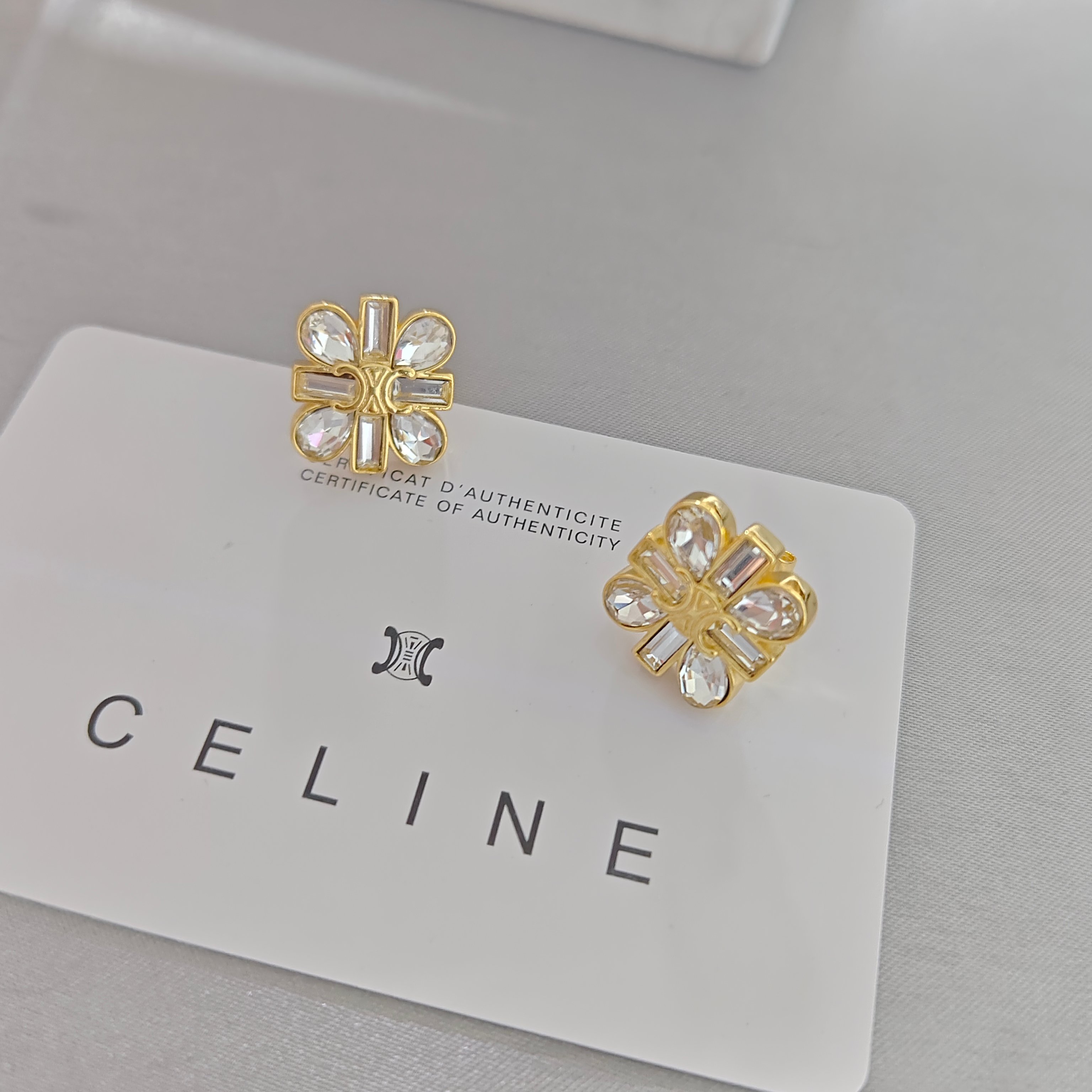 ￥88赛琳耳钉：新款凯旋门小雏菊daisy耳钉镶钻米字耳钉气质高级慵懒秋冬刘诗诗同款