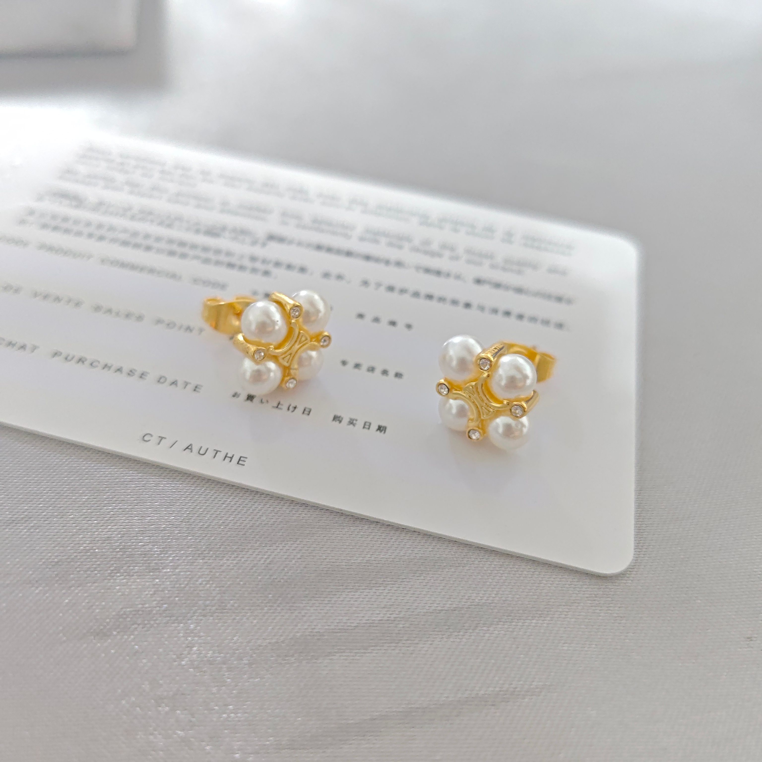 ￥88 赛琳耳饰：迷你凯旋门珍珠耳钉女2025新款爆款高级感耳环小巧精致花朵耳饰