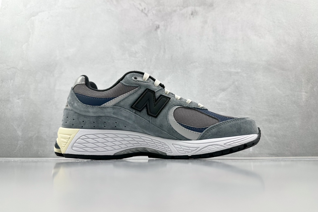 Top original JJJJound x New Balance NB 2002R gray, blue and black M2002RU2