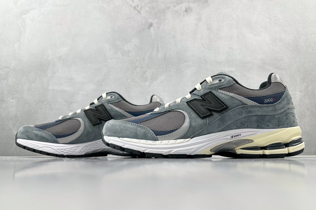 Top original JJJJound x New Balance NB 2002R gray, blue and black M2002RU2