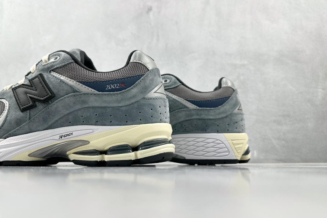 Top original JJJJound x New Balance NB 2002R gray, blue and black M2002RU2