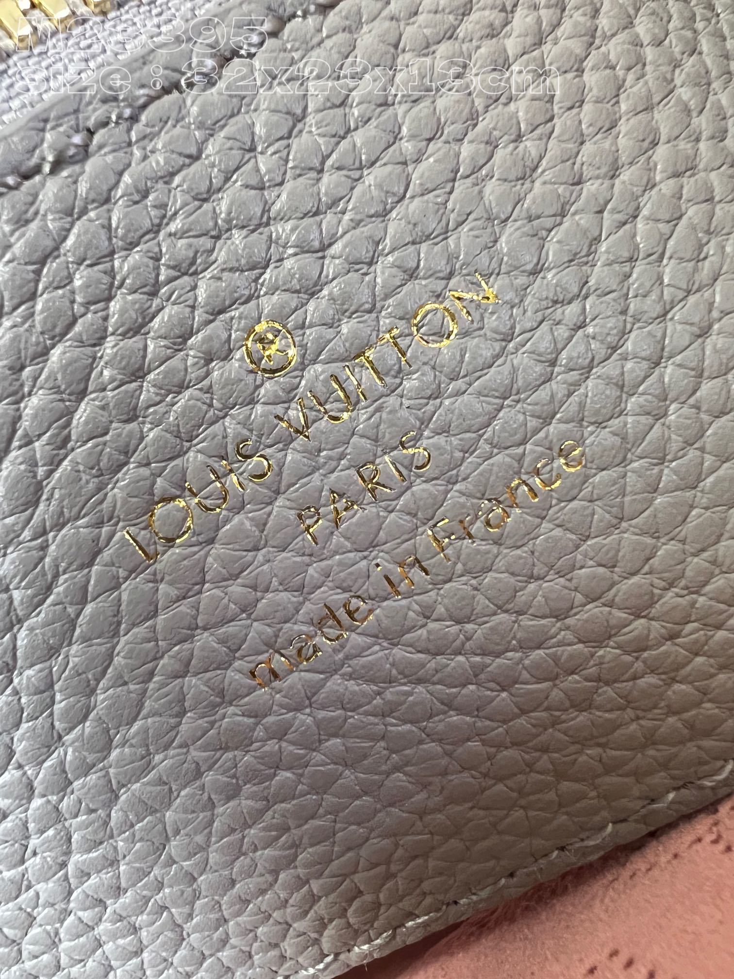 顶级原单M23395灰丝印本款BellaTote手袋以镂花穿孔牛皮革将水桶包和旅行袋融为一身柔软构型与柔