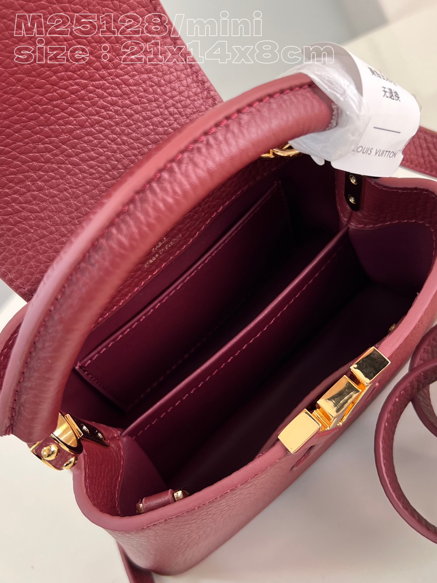 顶级原单M25128紫红/迷你本款Capucines迷你手袋展露细腻Taurillon皮革的微妙莹泽点缀