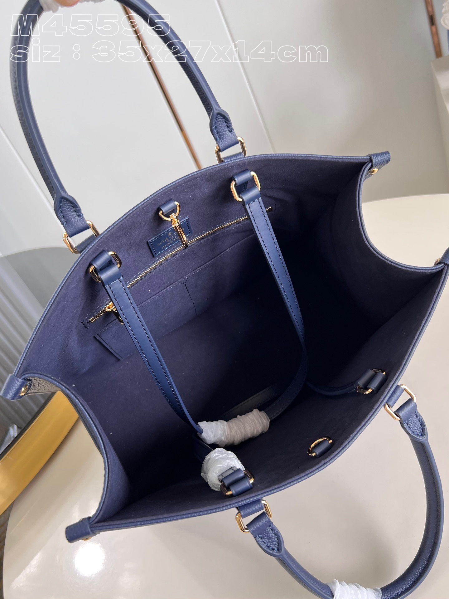 顶级原单M45595深蓝丝印本款OnTheGo中号手袋为柔软MonogramEmpreinte粒面牛皮革