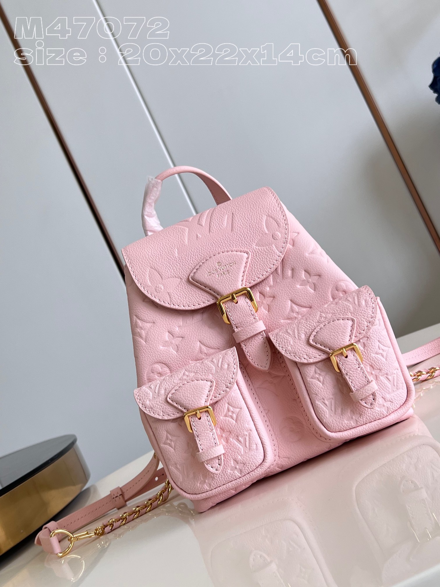 Louis Vuitton Bags Backpack Pink Weave Empreinte​ Cowhide Chains M47072