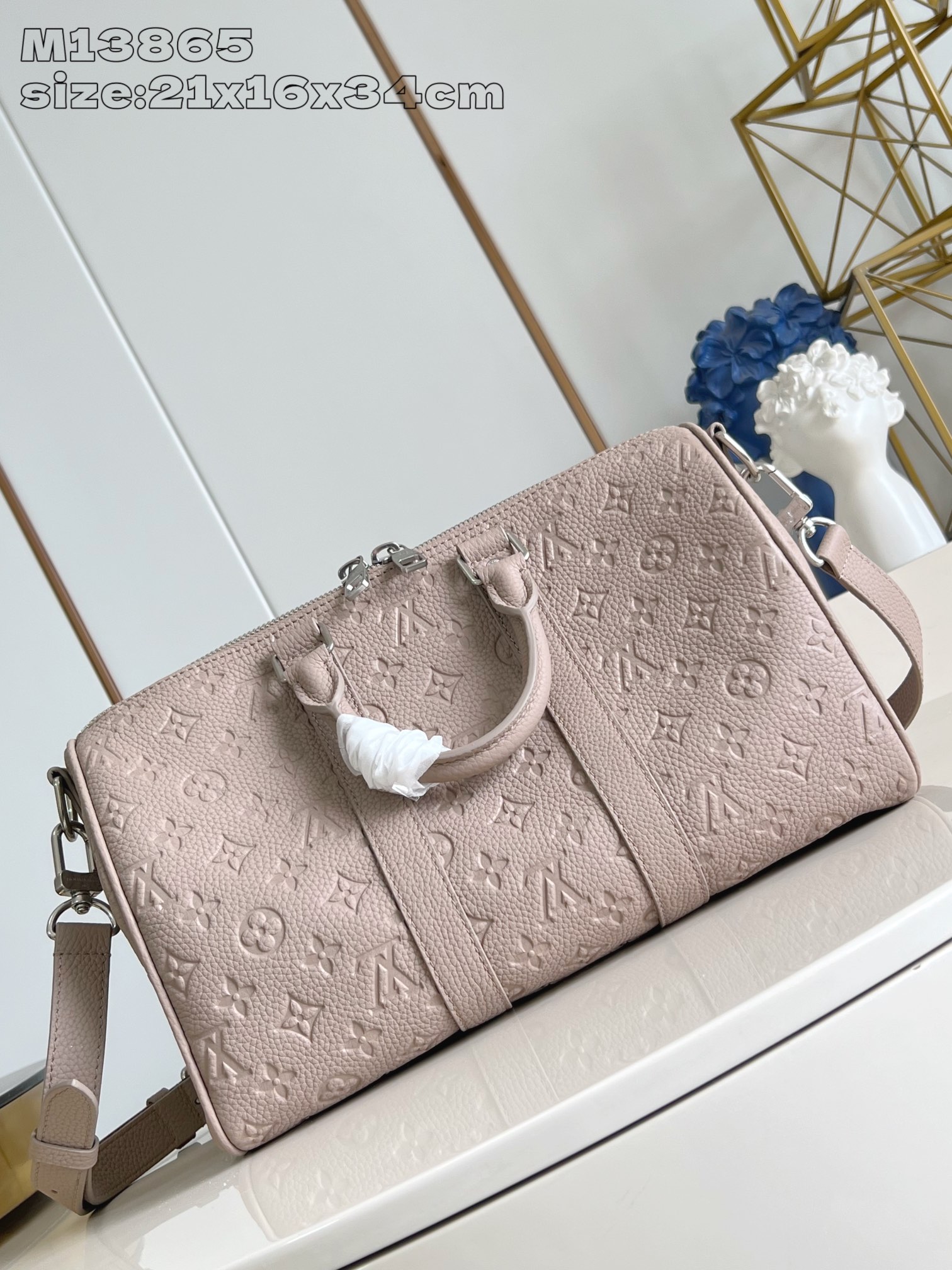 【顶级原单 M13865米黄 】本款 Keepall Bandoulière 35 中号手袋为 Taur
