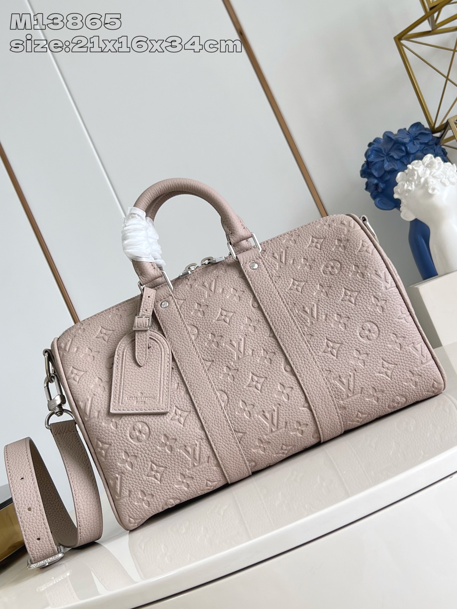 【顶级原单 M13865米黄 】本款 Keepall Bandoulière 35 中号手袋为 Taur