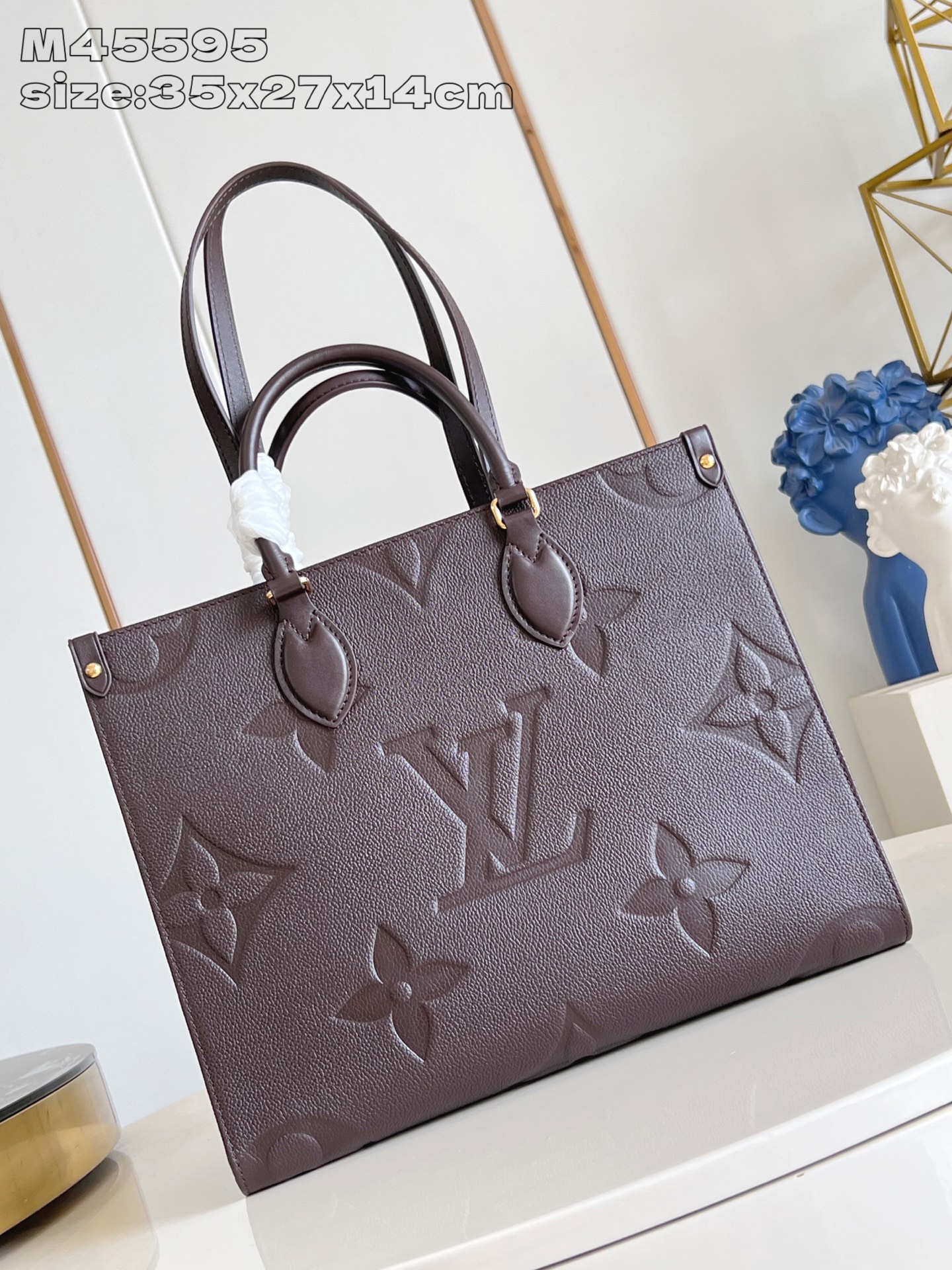 【顶级原单 M45595巧克力压花 】 本款 OnTheGo 中号手袋选用 Monogram Empre