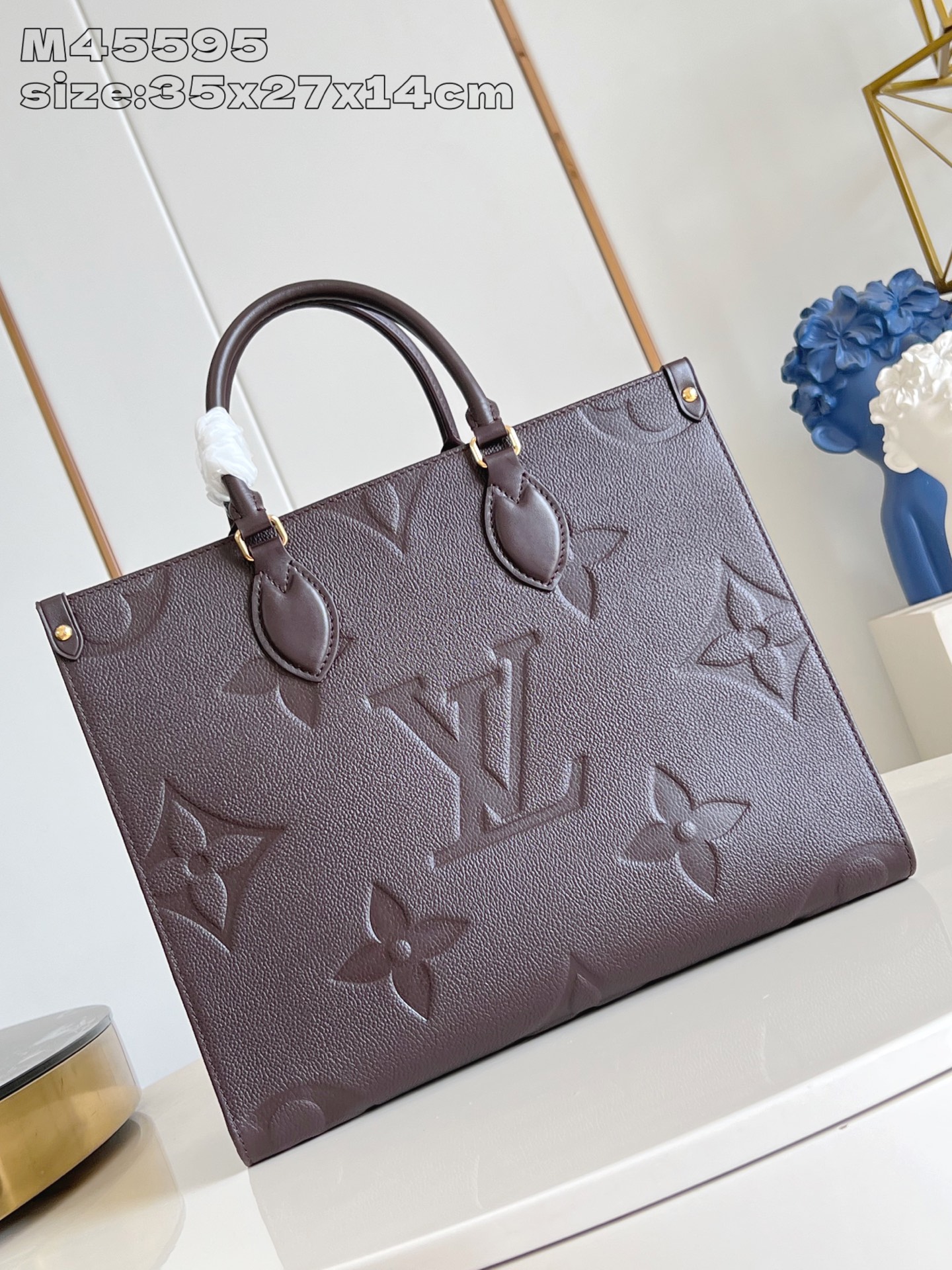 【顶级原单 M45595巧克力压花 】 本款 OnTheGo 中号手袋选用 Monogram Empre