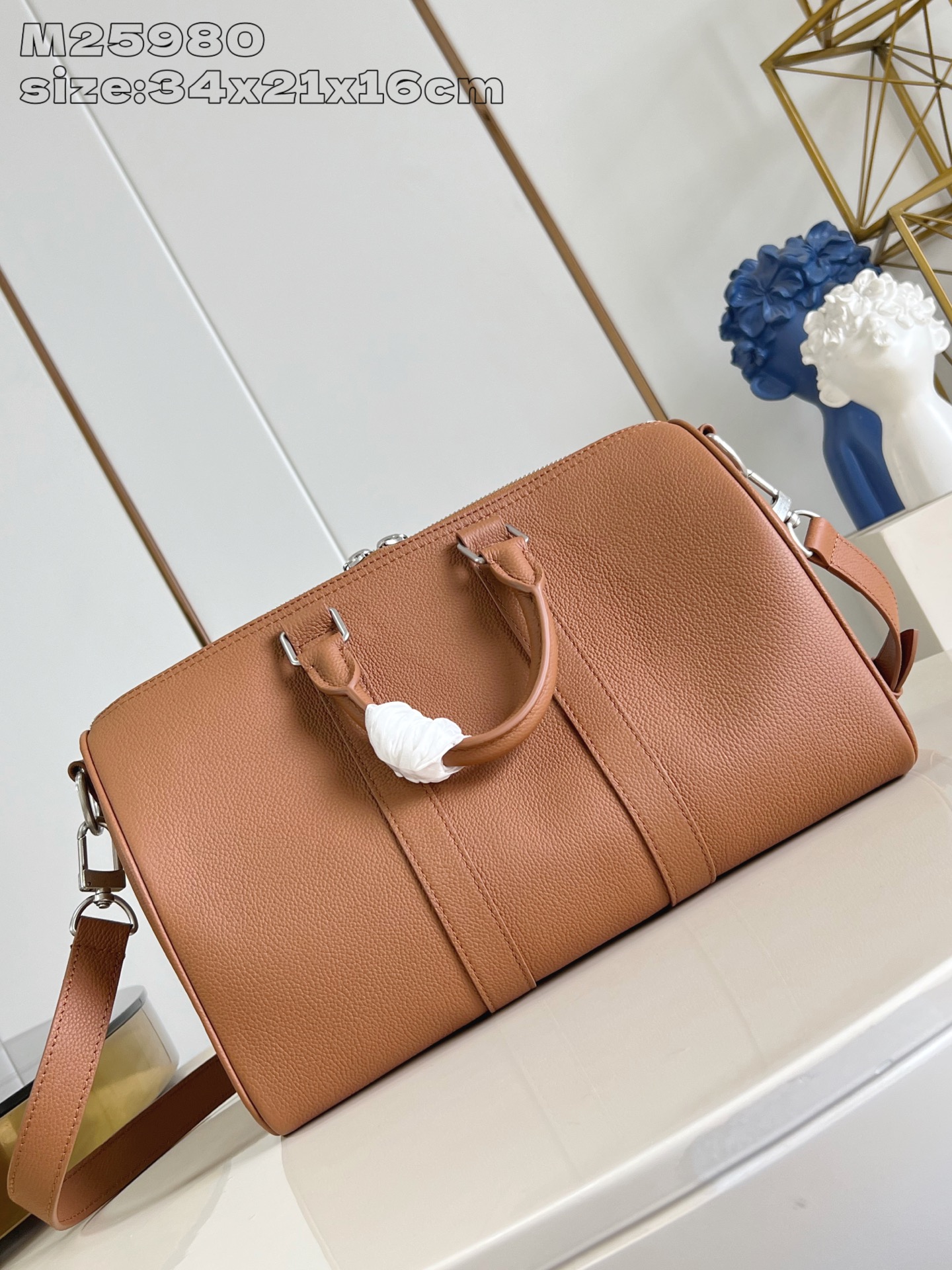 【顶级原单 M25980 】這款Keepall Bandoulière 35設計實用百搭，選用蠟面小牛皮