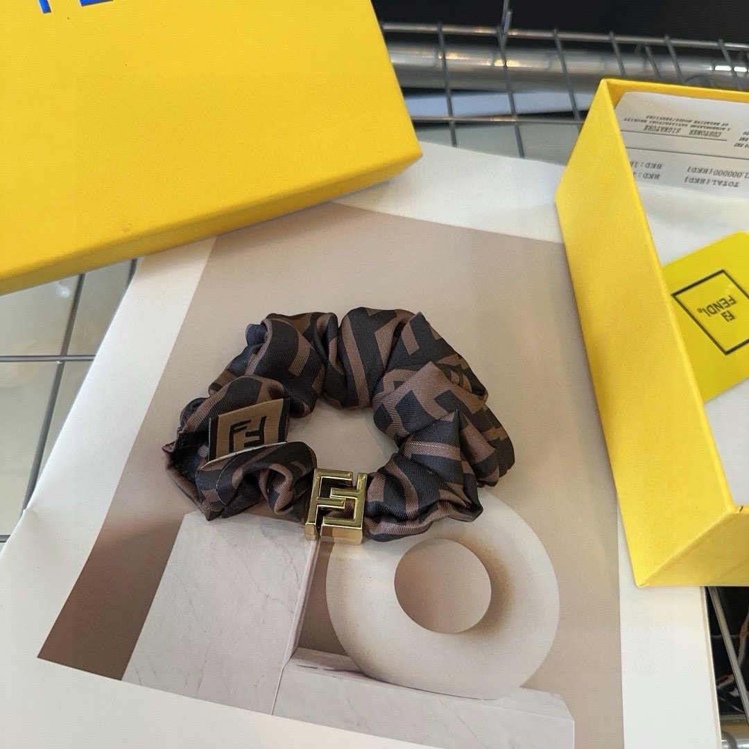 Fendi’s New F-Rings: Retro-Temperatures in Packaging Box with Condensed Fabric Pieces