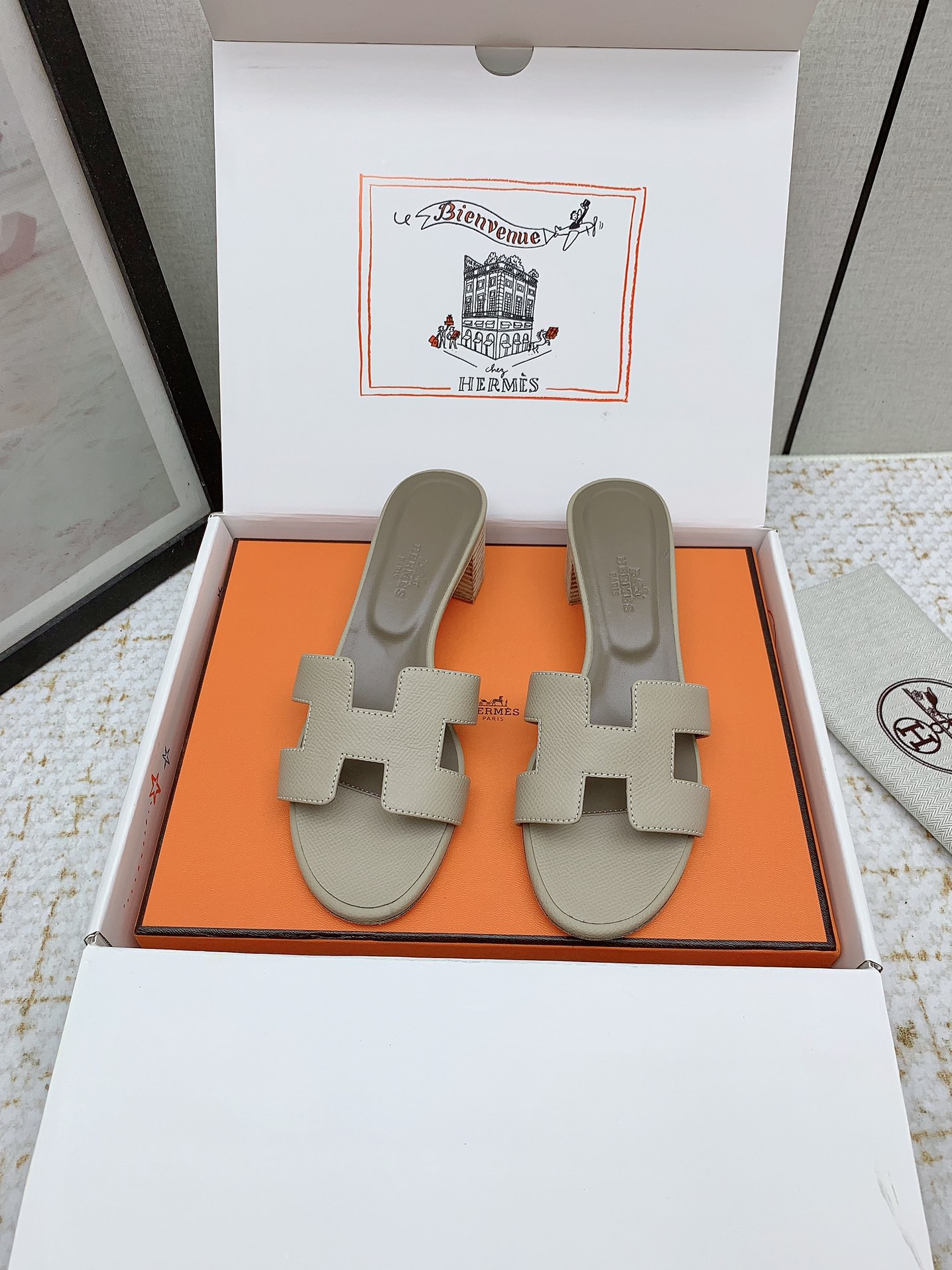 Hermes Oasis Sandal: Heeled Leather Slides with Signature 'H' Cutout 2 i1750231140 2406 8