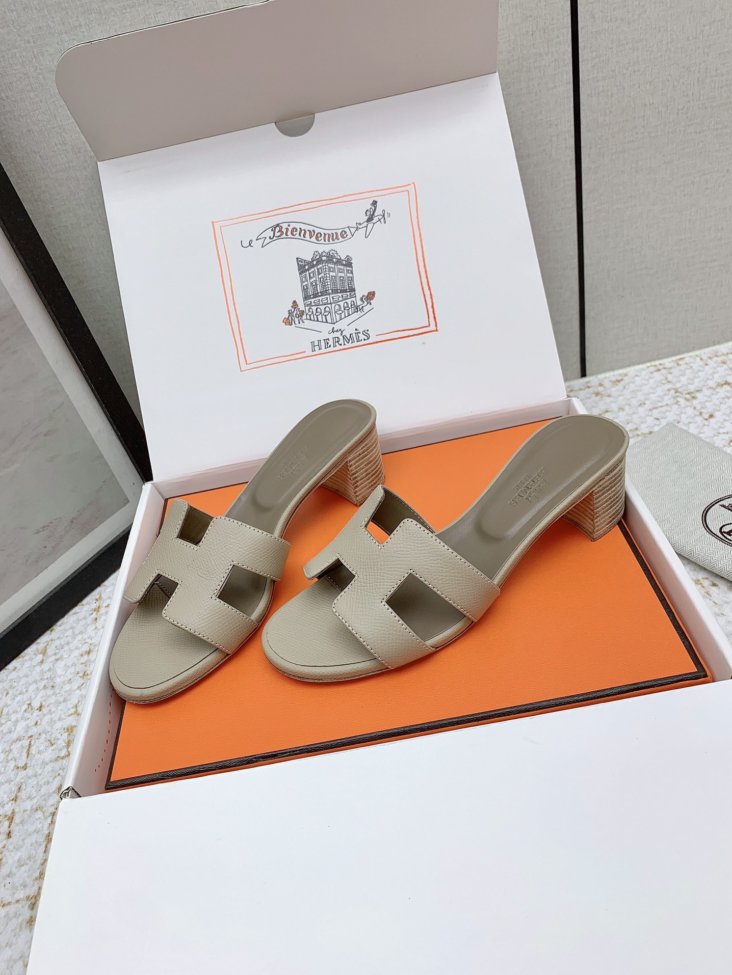 Hermes Oasis Sandal: Heeled Leather Slides with Signature 'H' Cutout 3 i1750231140 2556 4