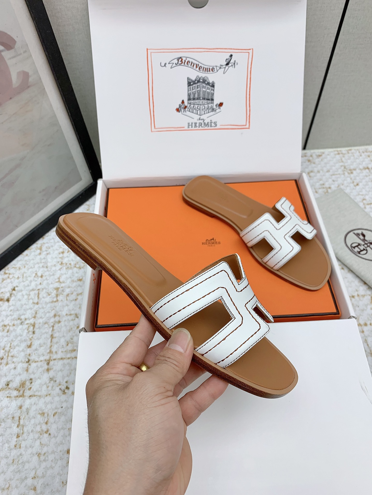 Hermès Oran Leather Sandals | Iconic Style & Comfort Slides for Women 5 i1750231861 7654 7