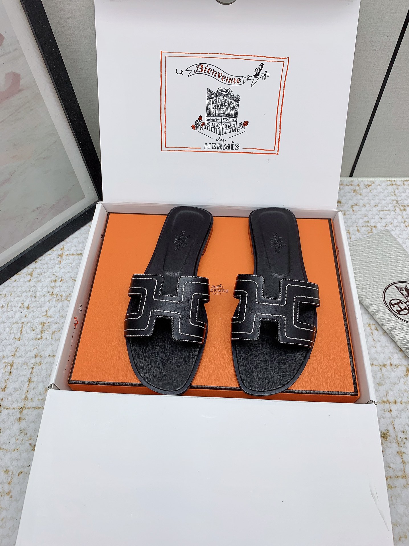 Hermès Oran Black Leather Sandals Iconic Slides Women's Shoes 2 i1750231887 9601 1