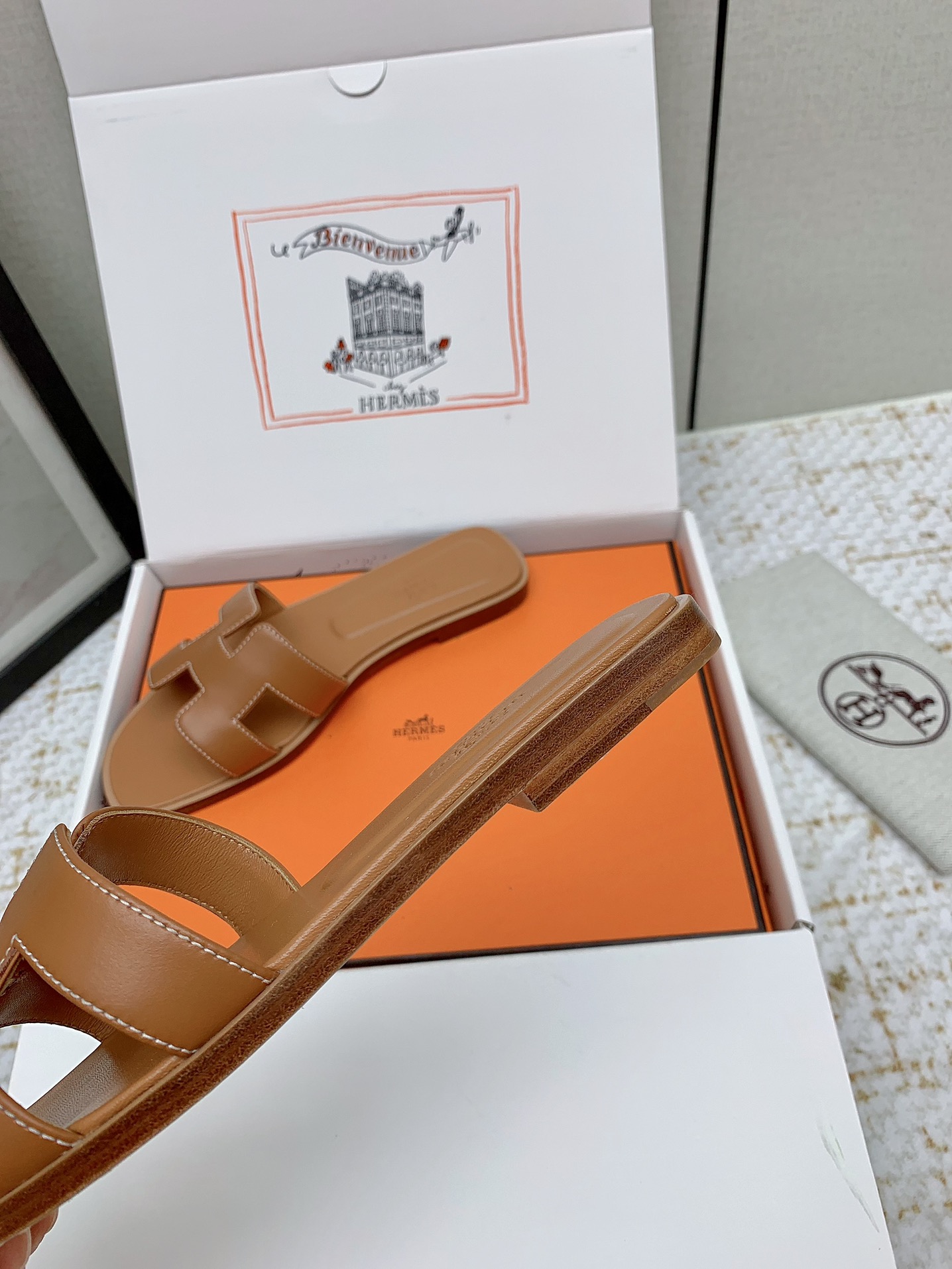 Hermès Oran Sandal: Iconic Leather Slides in Tan, Sizes 35-42 Available 9 i1750232773 5500 1
