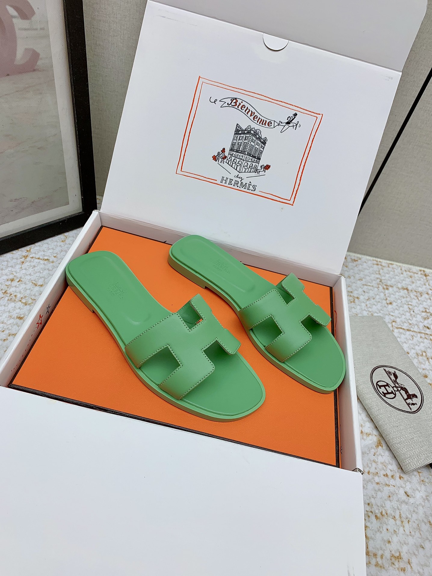 Hermès Oran Sandals, Green Leather Slides for Women, Available in Multiple Sizes 1 i1750232821 8709 1