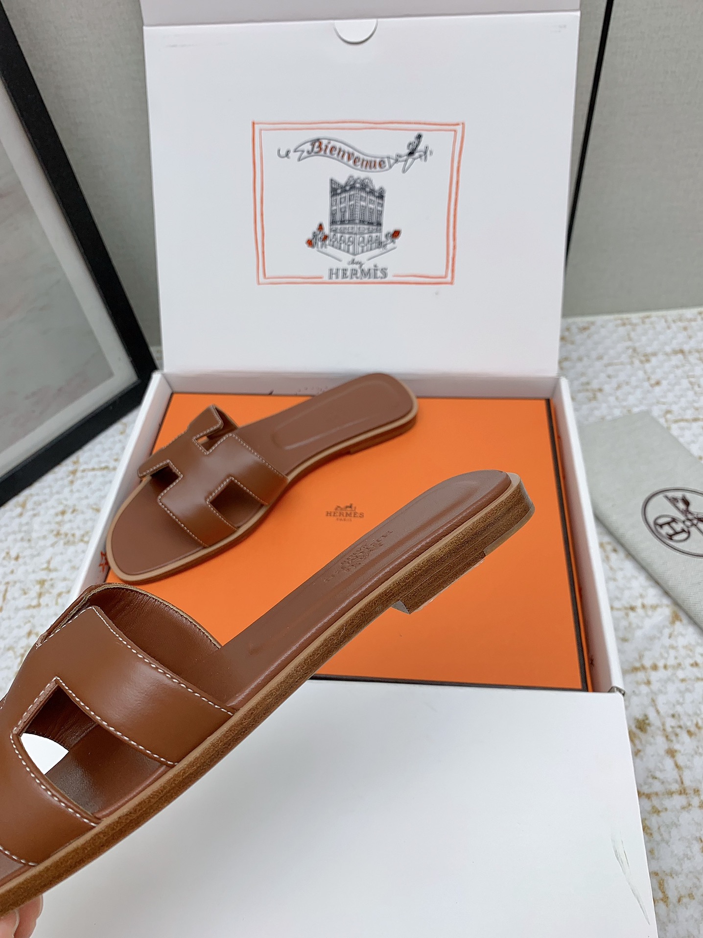 Hermès Oran Leather Slides - Iconic 'H' Cutout Design - Various Sizes Available 8 i1750232846 3469 6