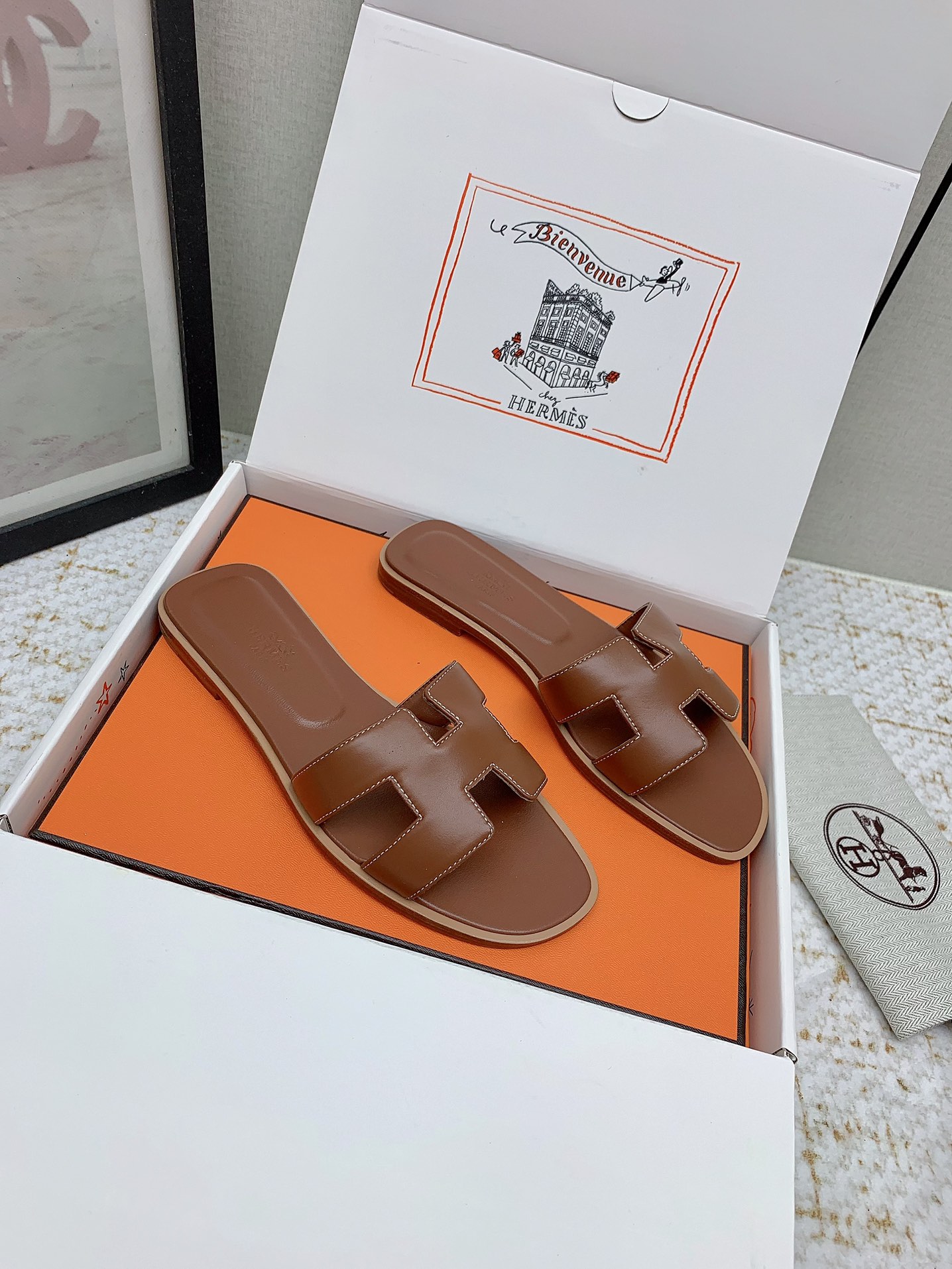 Hermès Oran Leather Slides - Iconic 'H' Cutout Design - Various Sizes Available 1 i1750232846 6037 3