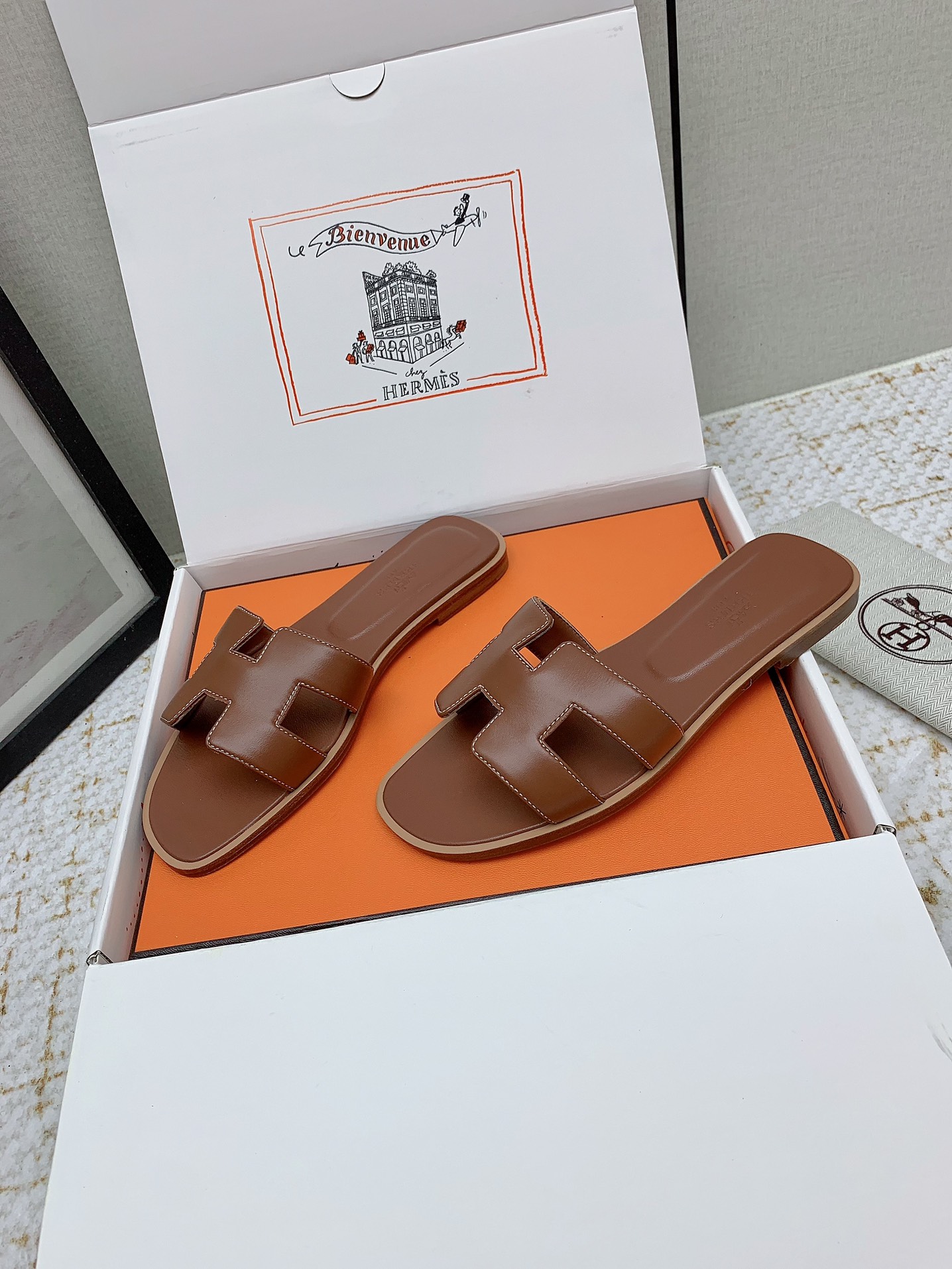 Hermès Oran Leather Slides - Iconic 'H' Cutout Design - Various Sizes Available 3 i1750232846 9259 1