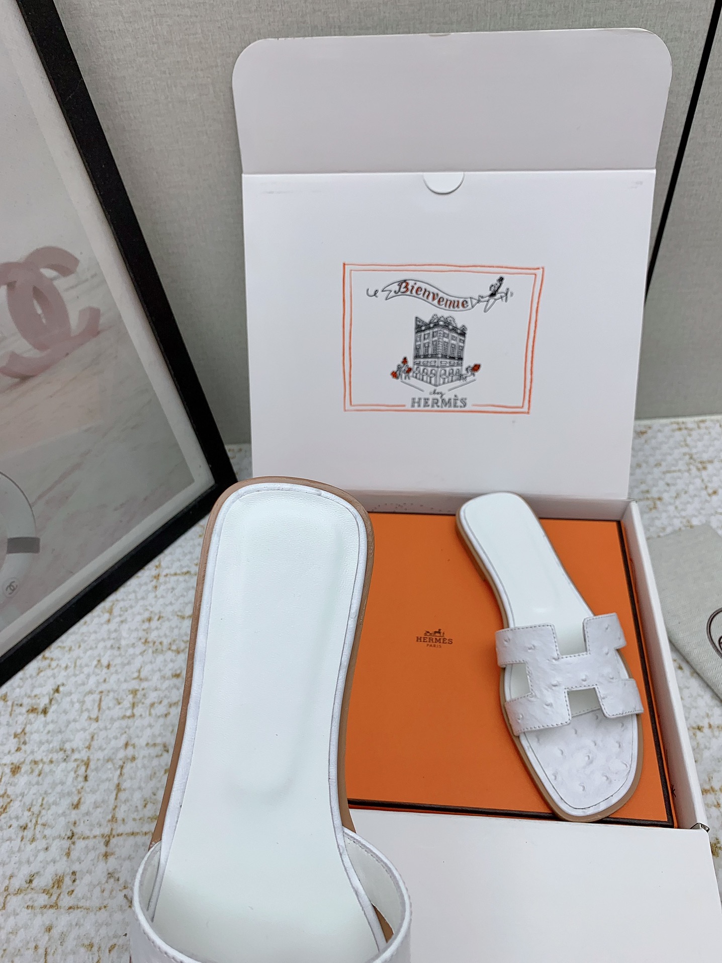 Hermès Oran White Ostrich Leather Sandals Elegant Summer Slides 7 i1750233879 1223 0