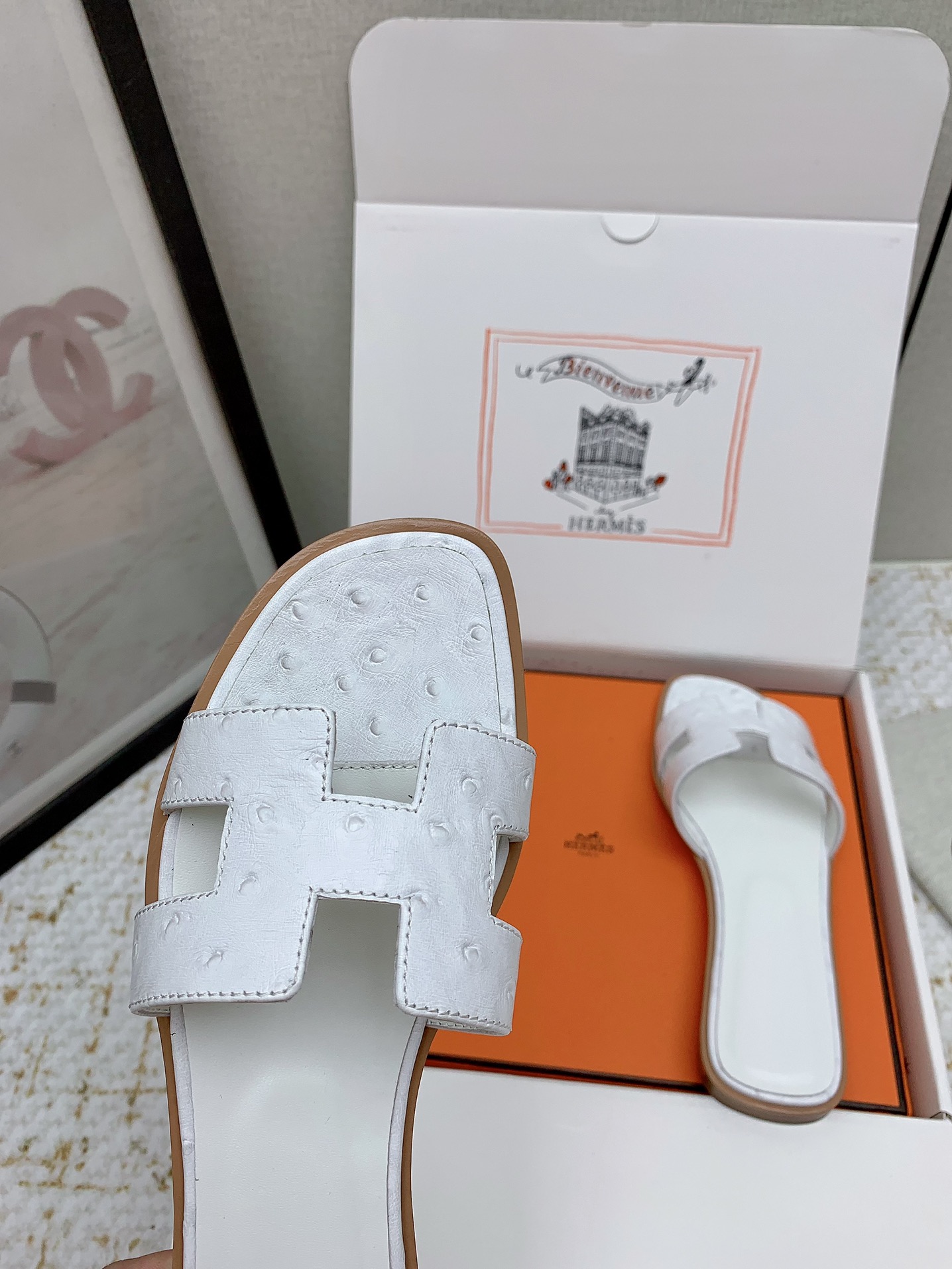 Hermès Oran White Ostrich Leather Sandals Elegant Summer Slides 10 i1750233879 3045 7