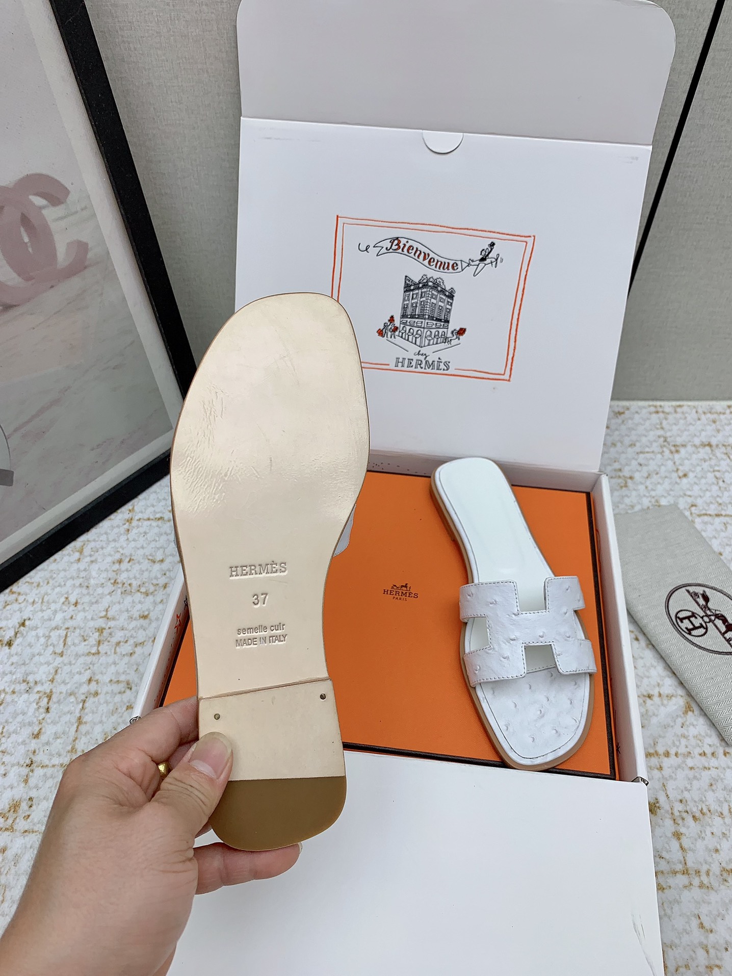 Hermès Oran White Ostrich Leather Sandals Elegant Summer Slides 8 i1750233879 8091 3