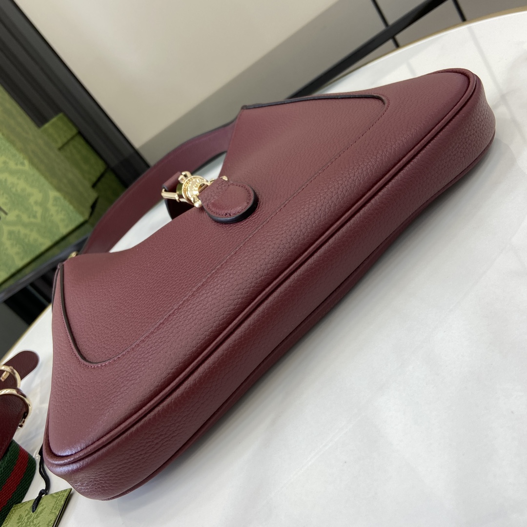 Gucci 内部：一个拉链袋，饰Gucci徽章拉链头