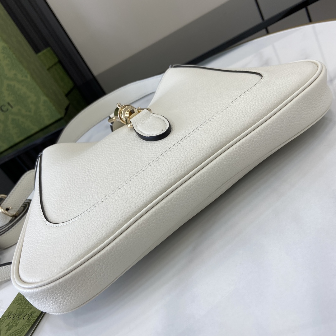 Gucci 内部：一个拉链袋，饰Gucci徽章拉链头