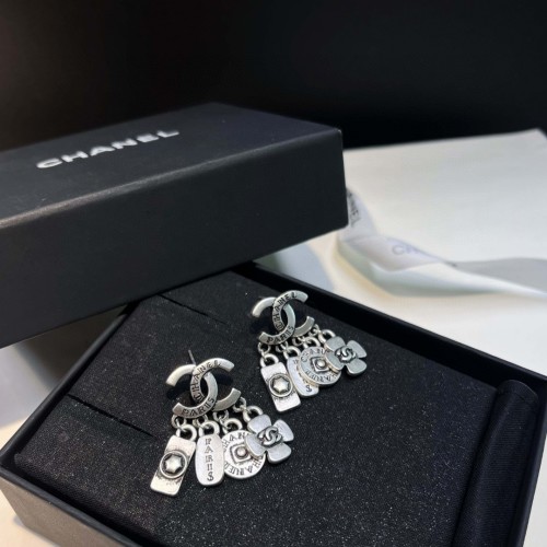 Chanel Bronze Double C Earrings with Charms - Stylish and Versatile 1 Chanel Bronze Double C Earrings with Charms - Stylish and Versatile