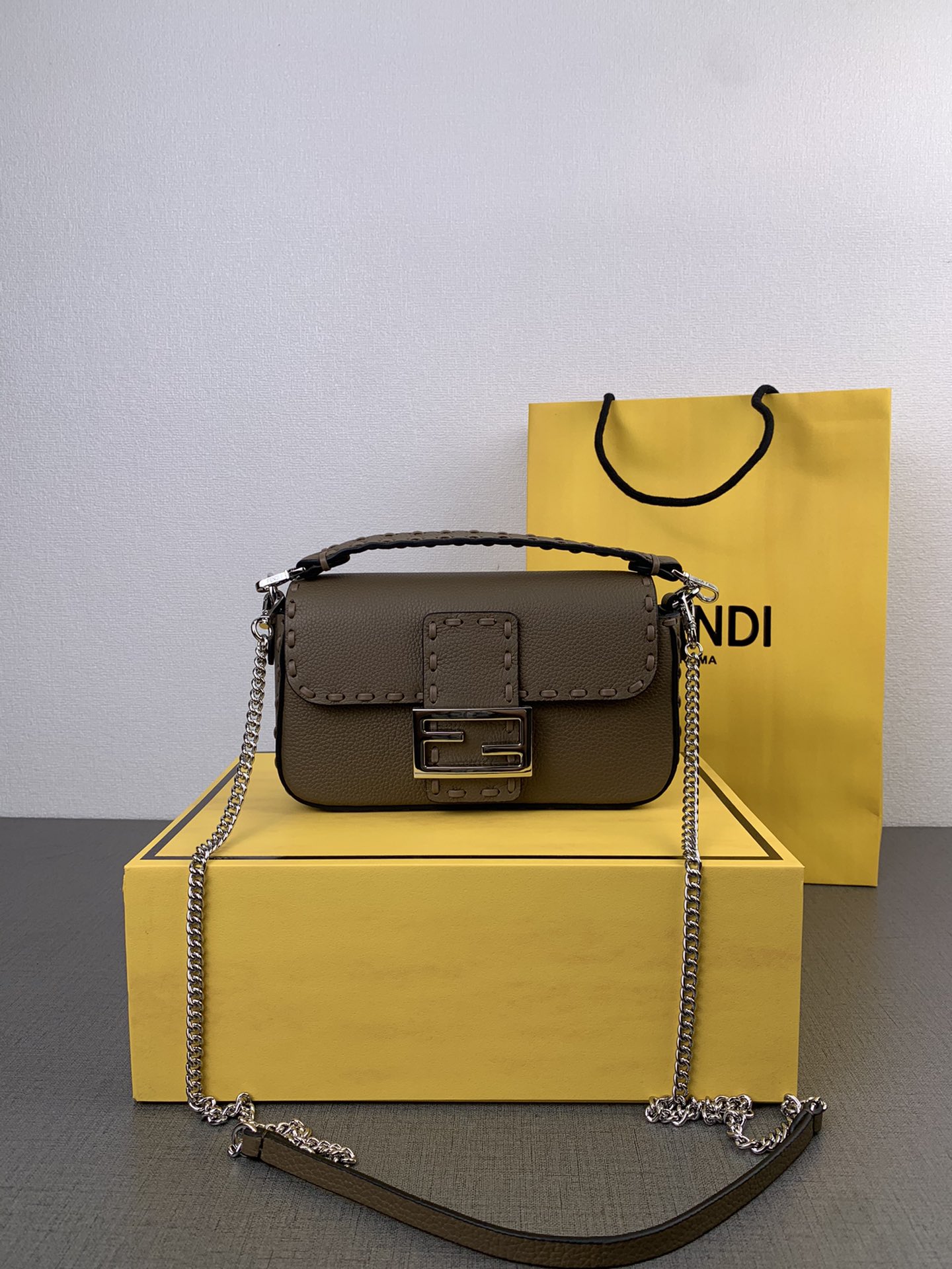 🆕  The color of this FD Baguette is absolutely stunning! The khaki Roman calf leather paired with Selleria hand stitching in a classic design is incredibly beautiful. The silver F clasp and delicate stitching add a soft and healing touch that is hard for fairy-like girls not to love. Model number 2037, size 20 x 13 x 5. image 1