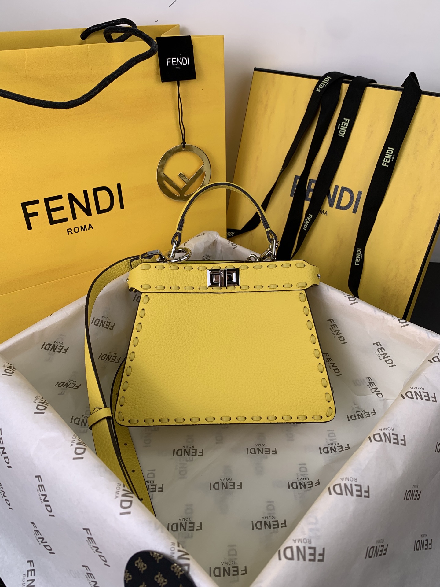 🆕  ✔️ Mini Peekaboo in yellow natural grain calfskin with sheepskin lining. Soft and comfortable to touch. Compact and stylish, perfect for any occasion. Item number 88N329, size 20 x 15.5 x 11. Get yours now! ✨✨😍 image 1