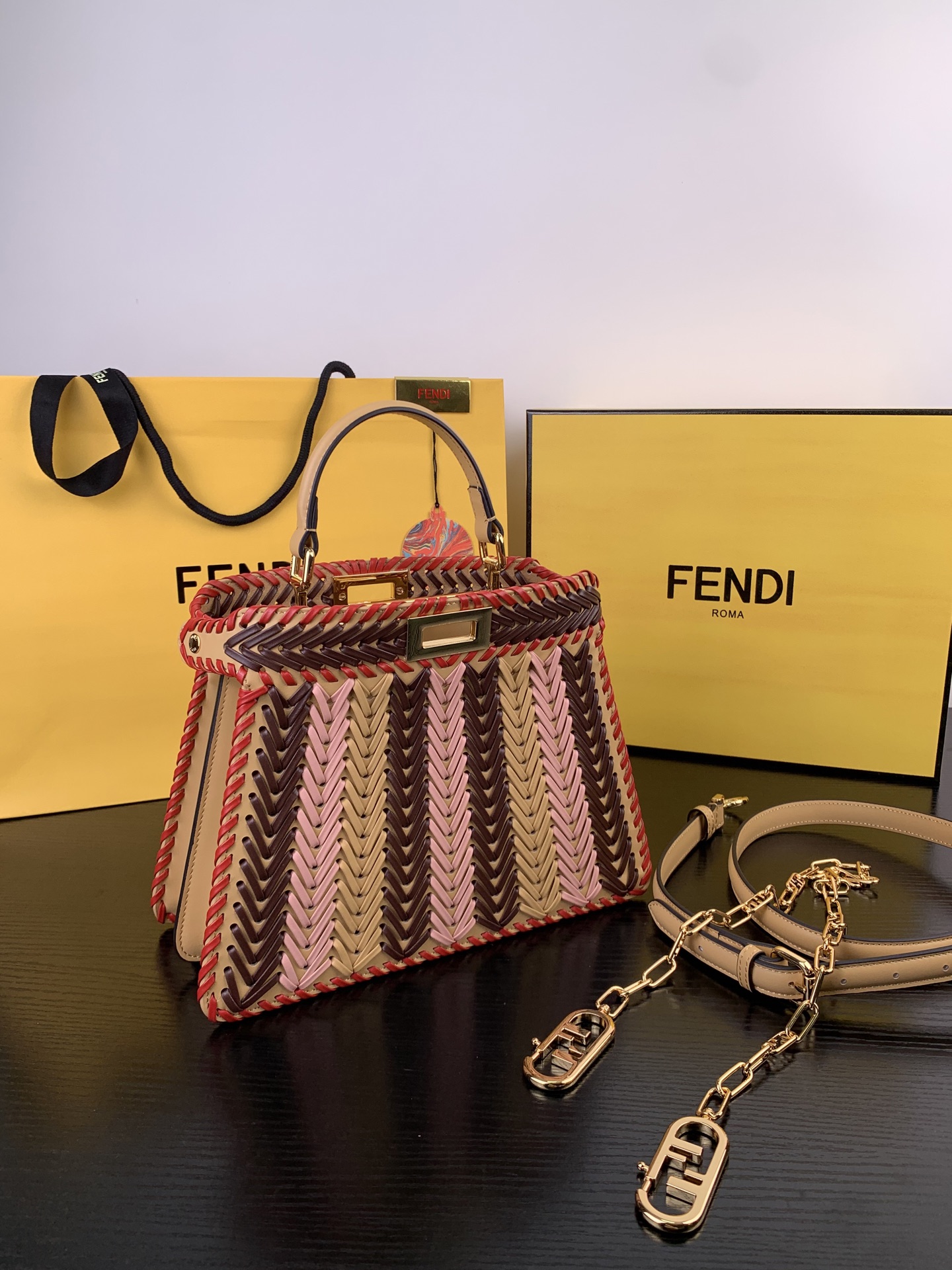 🆕  ✔️ This beautifully woven peekaboo bag in contrasting cowhide is absolutely stunning 😍 Each side of the bag features a unique design, allowing you to switch between different styles effortlessly. The understated luxury of the weaving craftsmanship exudes a personal sense of fashion. Classics always stay ahead of trends and at the forefront of fashion ❤️ Don't miss out on this beauty - it's truly exquisite 💯 Style number: 88N336 Size: 27 x 21 x 11 image 1
