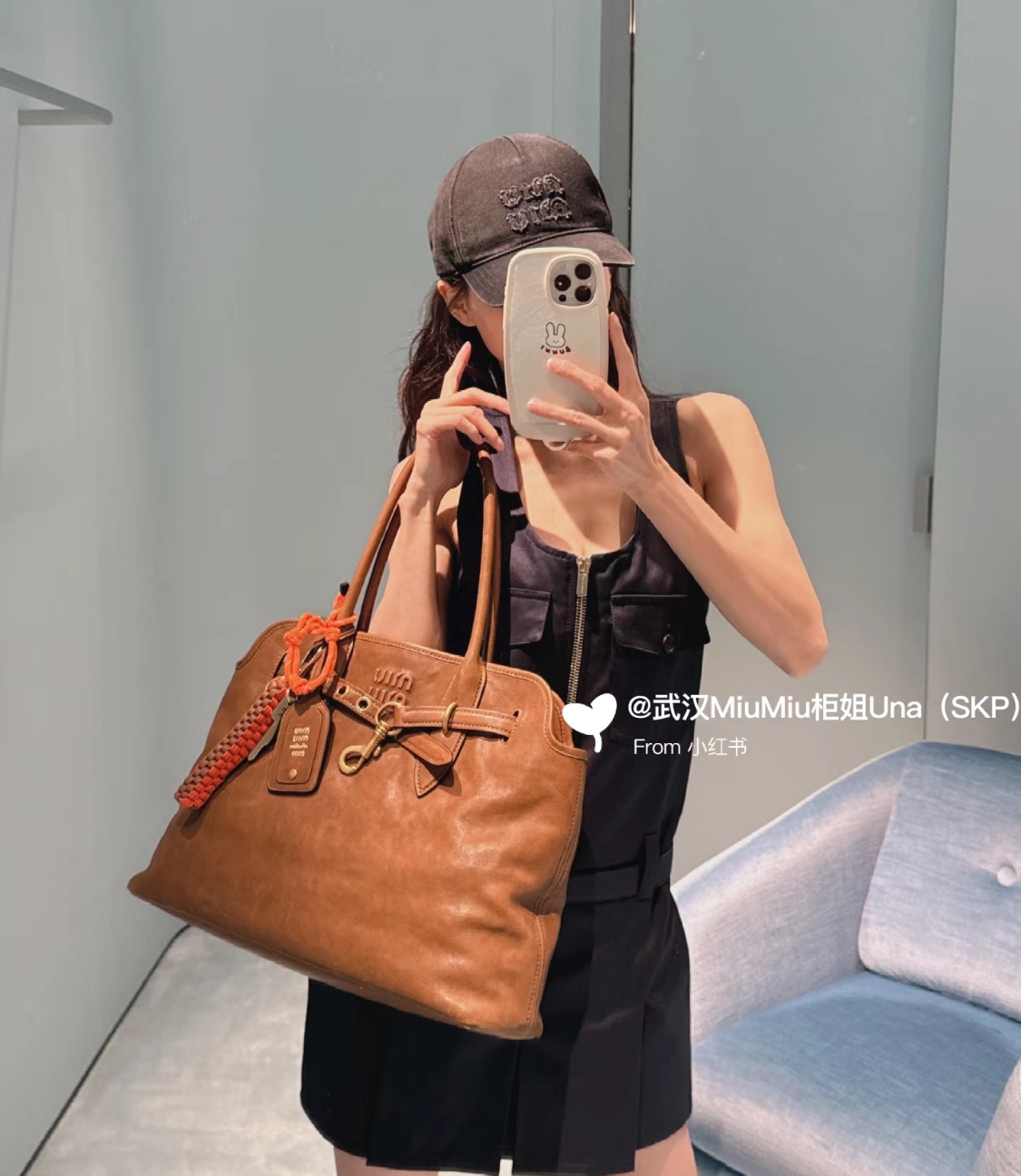A classic tote bag designed with a softly structured silhouette, a - Comprehensive 2