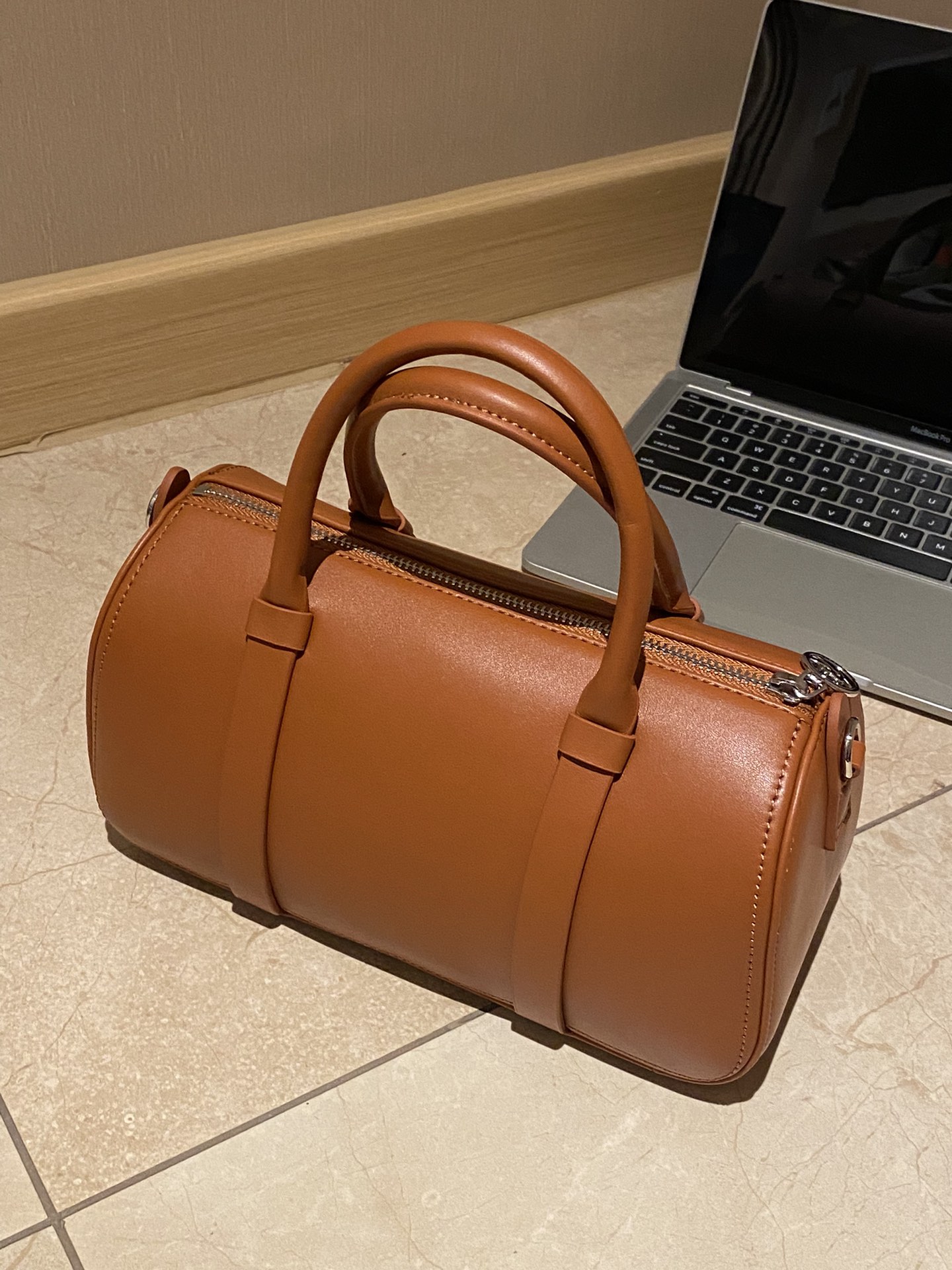Striking at first glance, this bag features exceptional in-person - Comprehensive 4