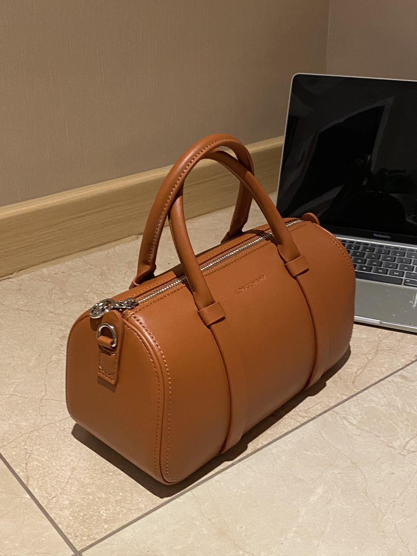 Striking at first glance, this bag features exceptional in-person - Comprehensive 2