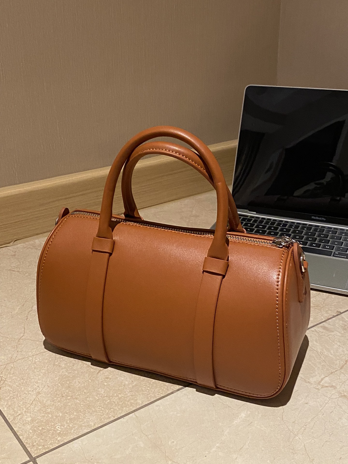 Striking at first glance, this bag features exceptional in-person - Comprehensive 3