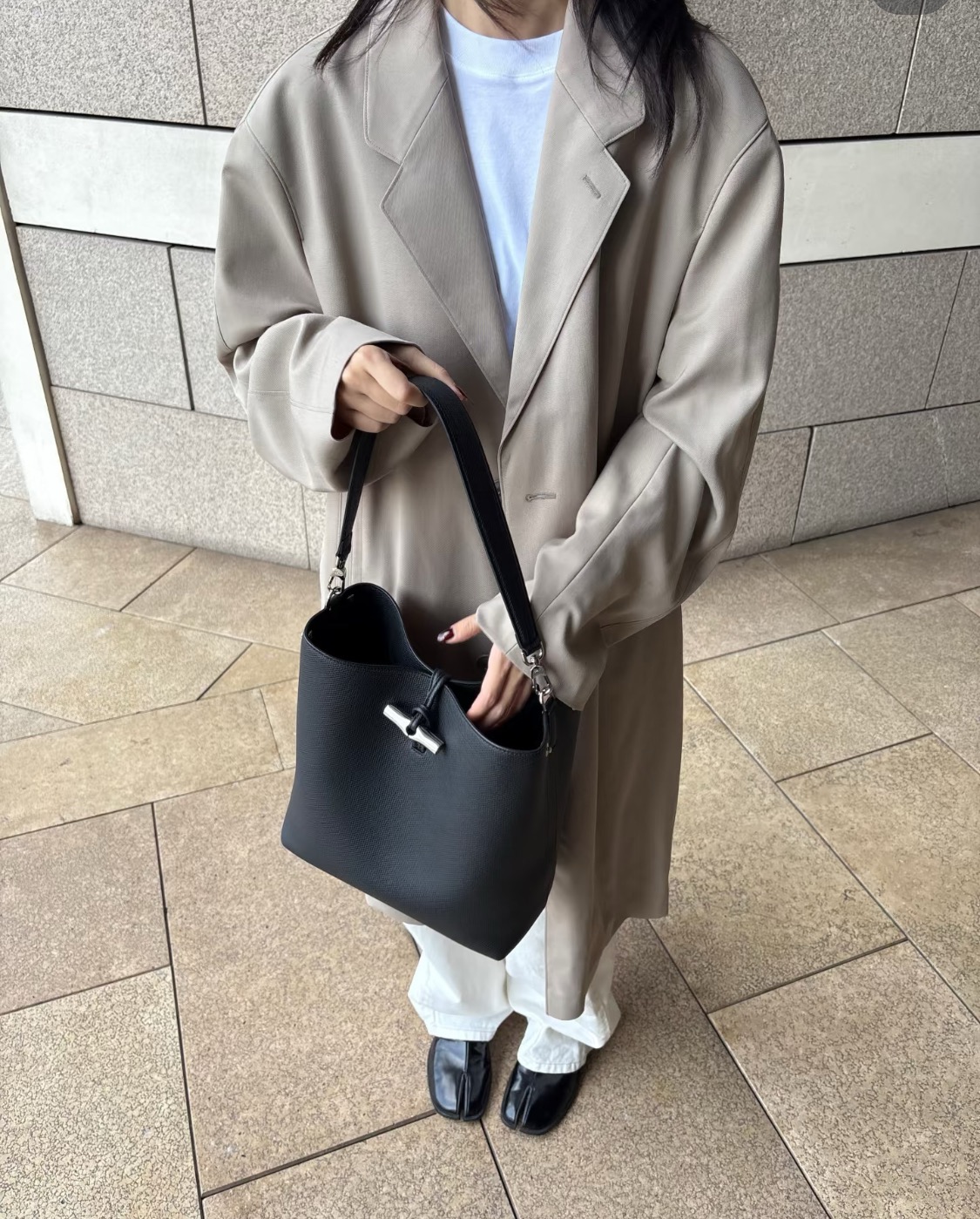 reminiscent of the iconic luxury bucket bag silhouette - Comprehensive 6