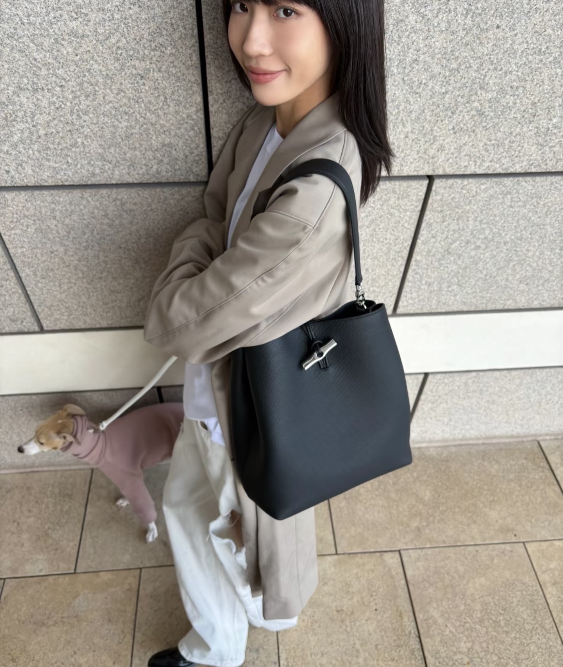 reminiscent of the iconic luxury bucket bag silhouette - Comprehensive 5