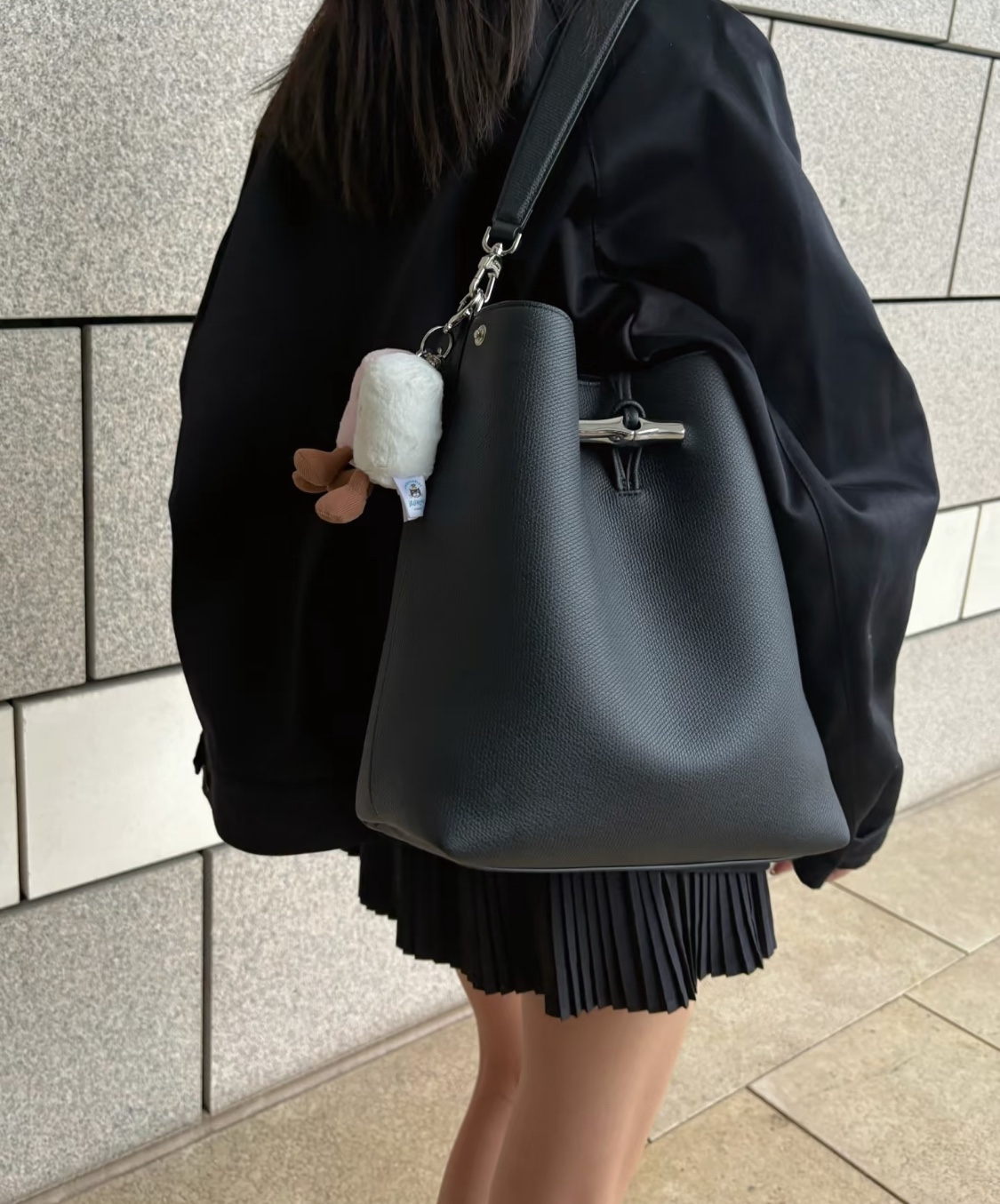 reminiscent of the iconic luxury bucket bag silhouette - Comprehensive 9