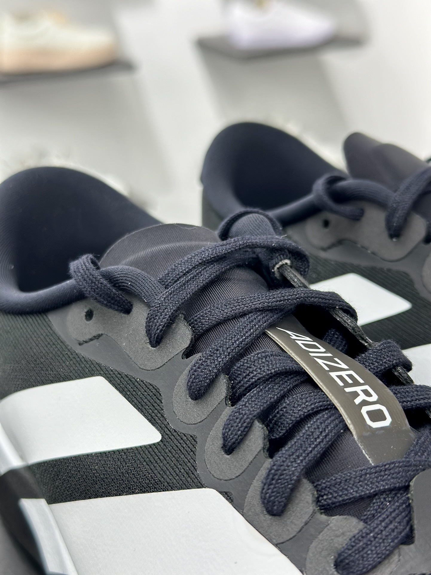 阿迪达斯Adidas Adizero Eva SL M”Black White”零度进化版系列低帮慢跑鞋“网织黑白”JP7149