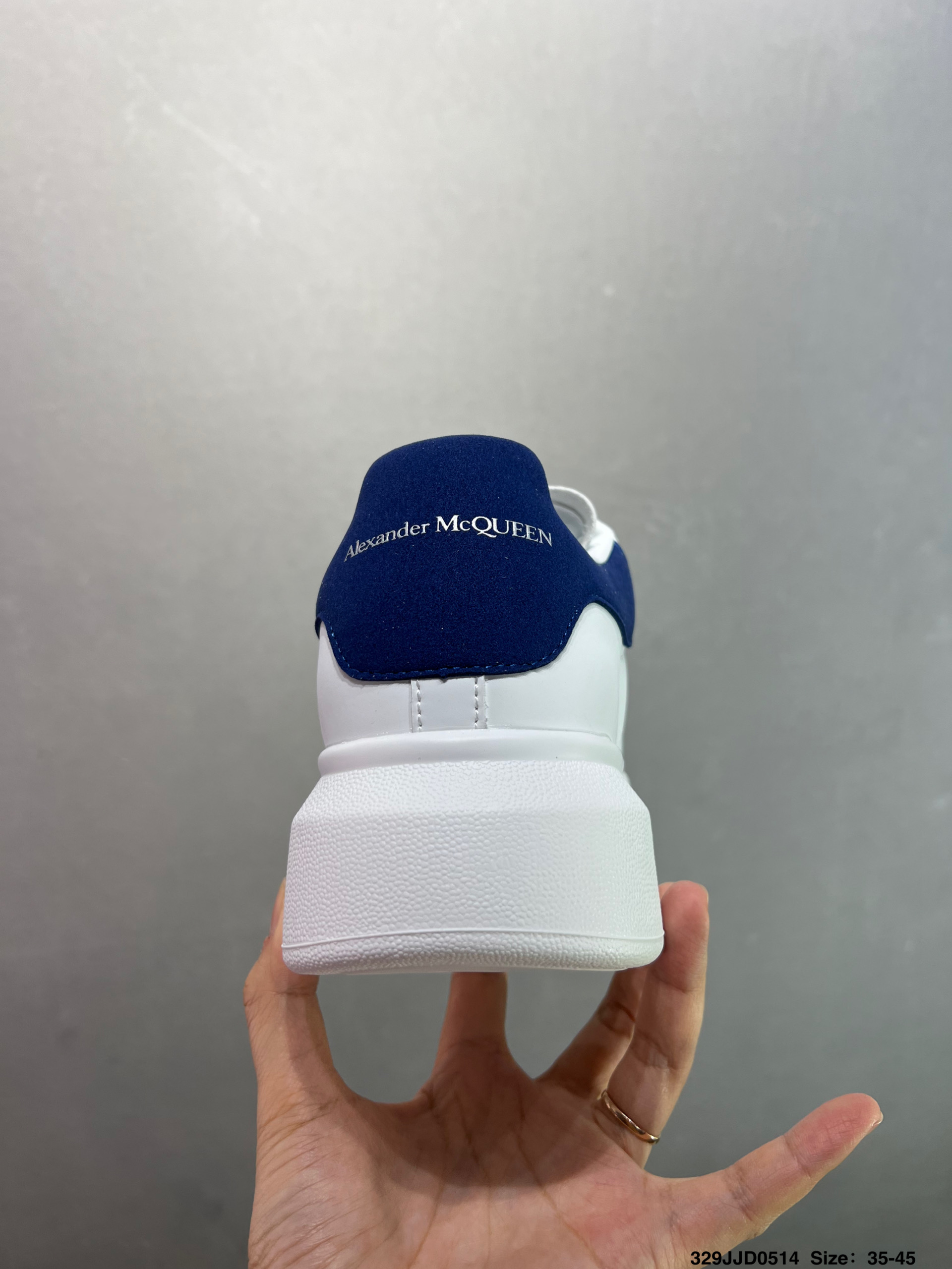Alexander McQueen Oversized White Leather Sneakers with Blue Heel Tab 5 i1747147616974 2100 0 3
