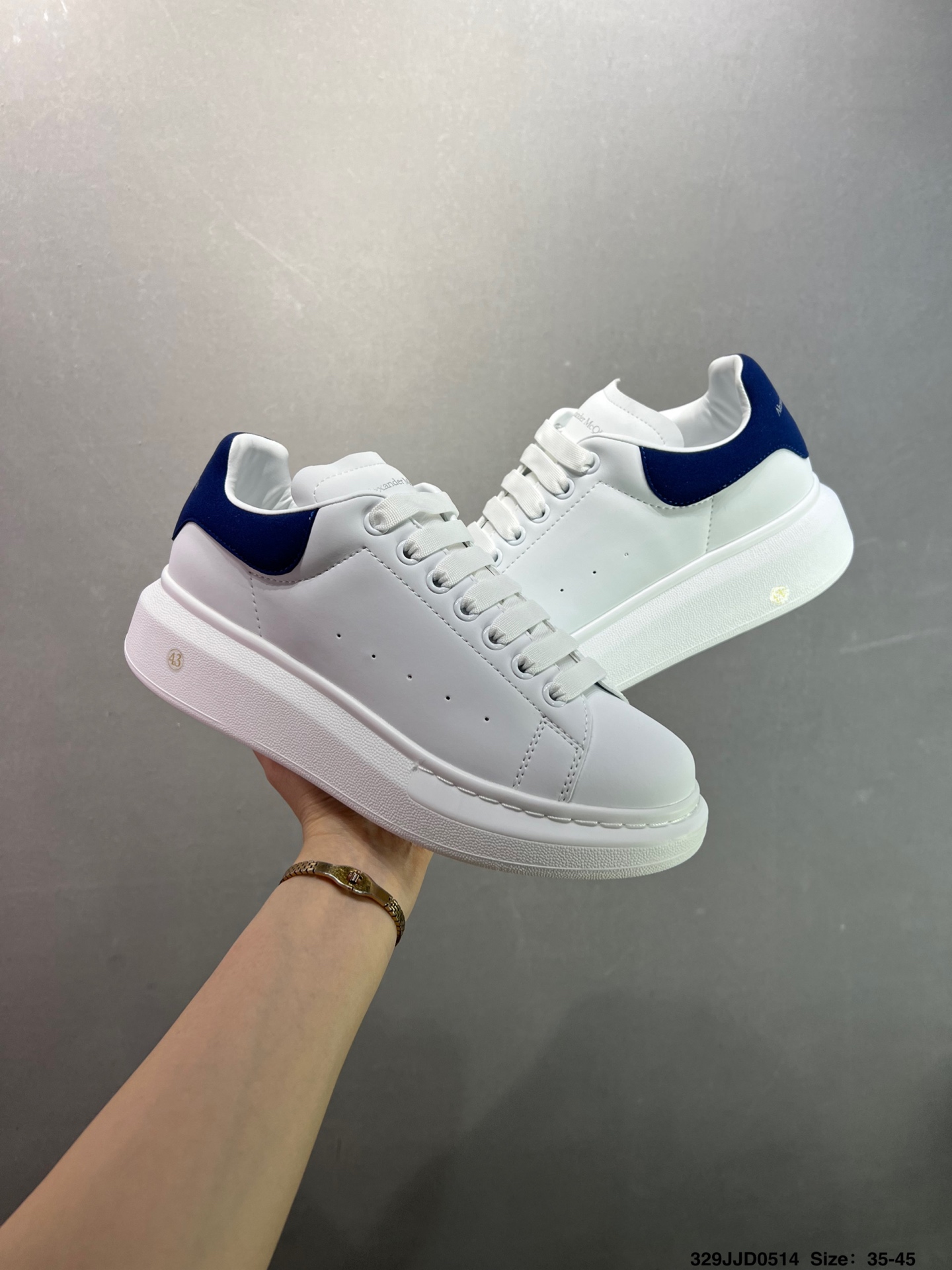 Alexander McQueen Oversized Sole Leather Sneakers - White/Navy 2 i1747147617027 4727 0 7