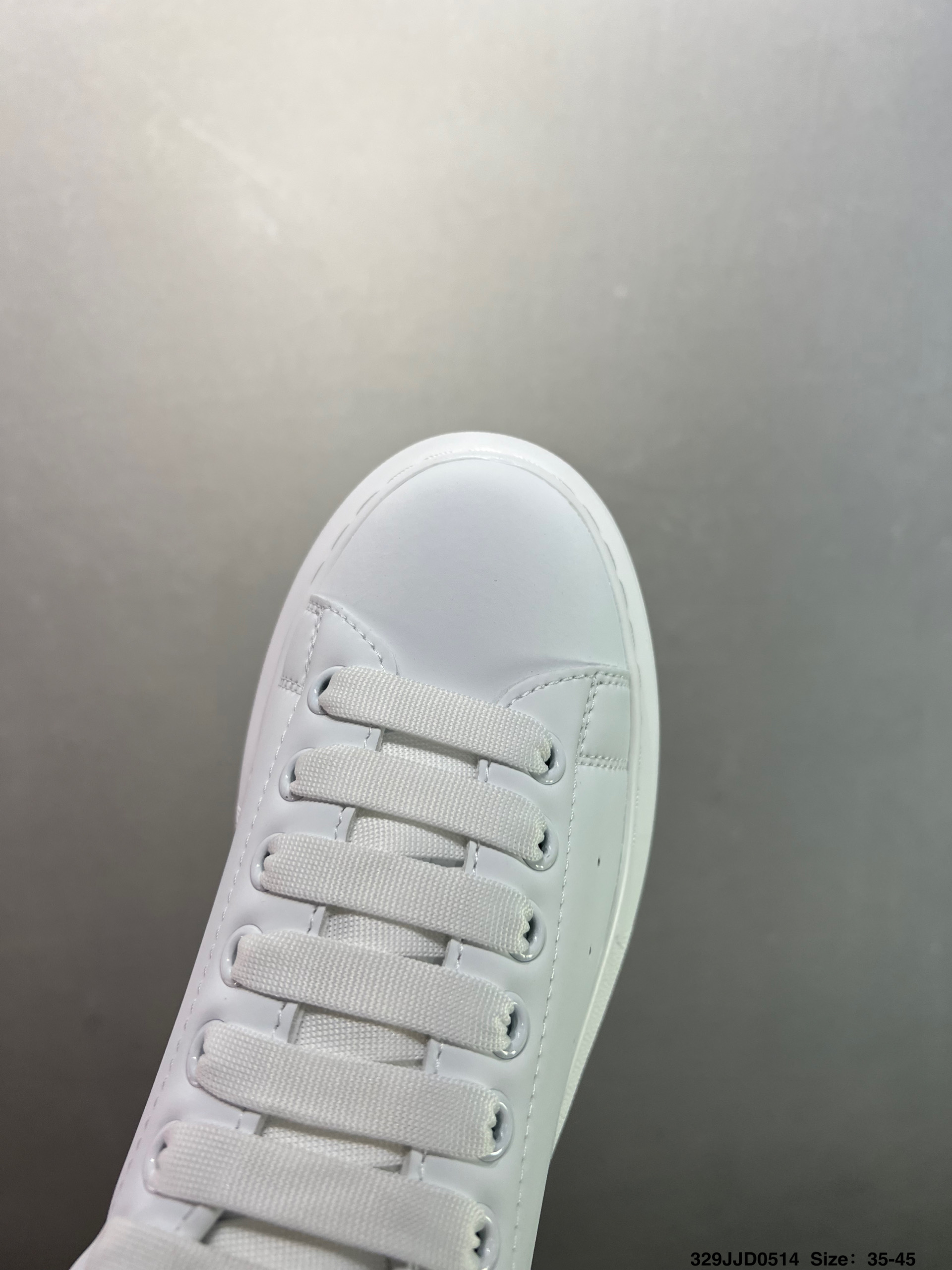 Alexander McQueen Oversized White Leather Sneakers with Blue Heel Tab 6 i1747147618083 2557 0 4