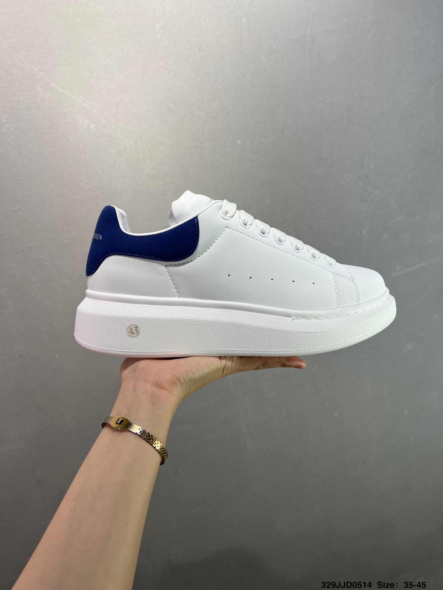 Alexander McQueen Oversized White Leather Sneakers with Blue Heel Tab 2 i1747147618294 9855 0 0