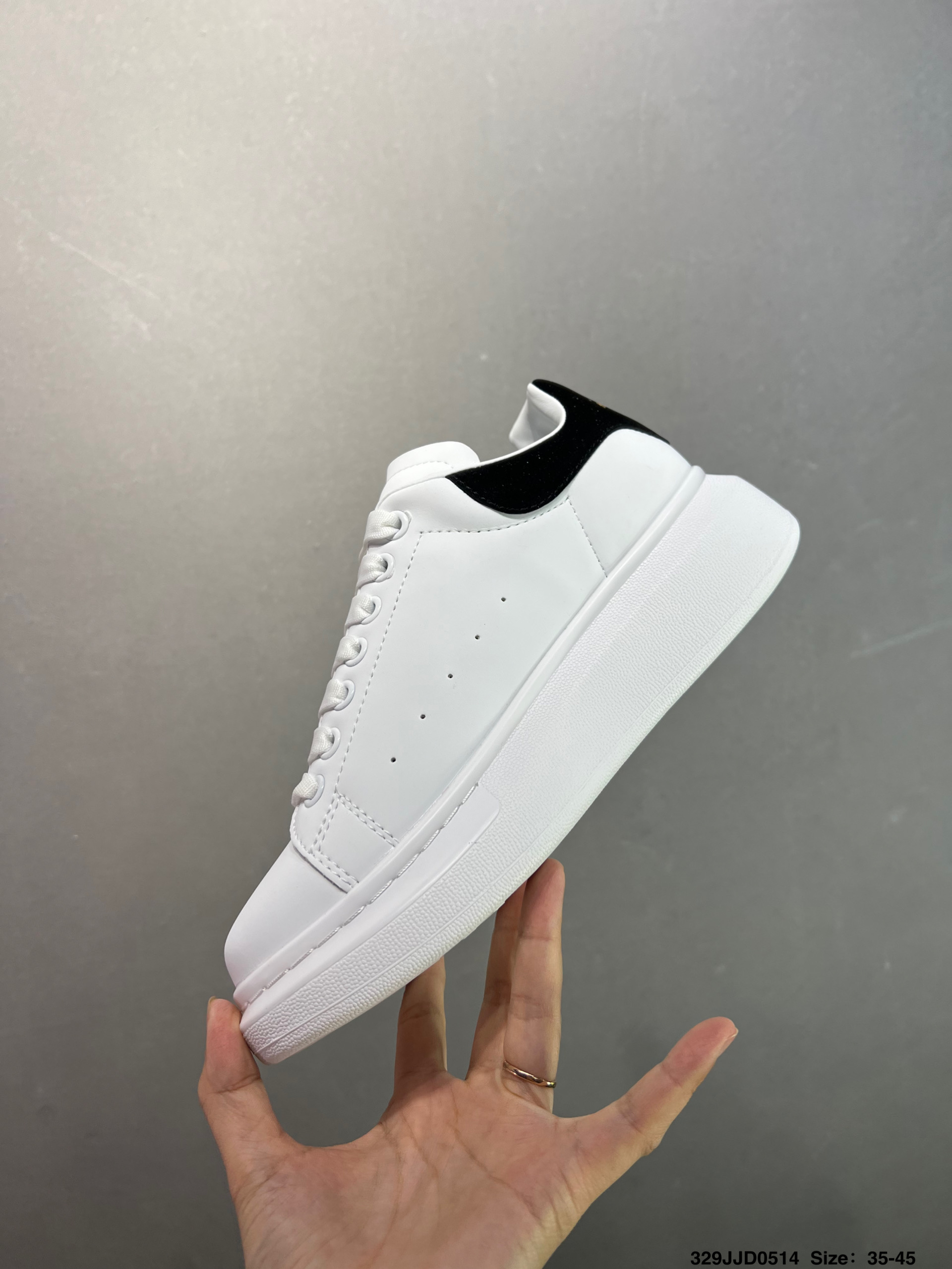 Alexander McQueen Oversized White Leather Sneakers - Iconic & Stylish 4 i1747147676047 3151 0 2