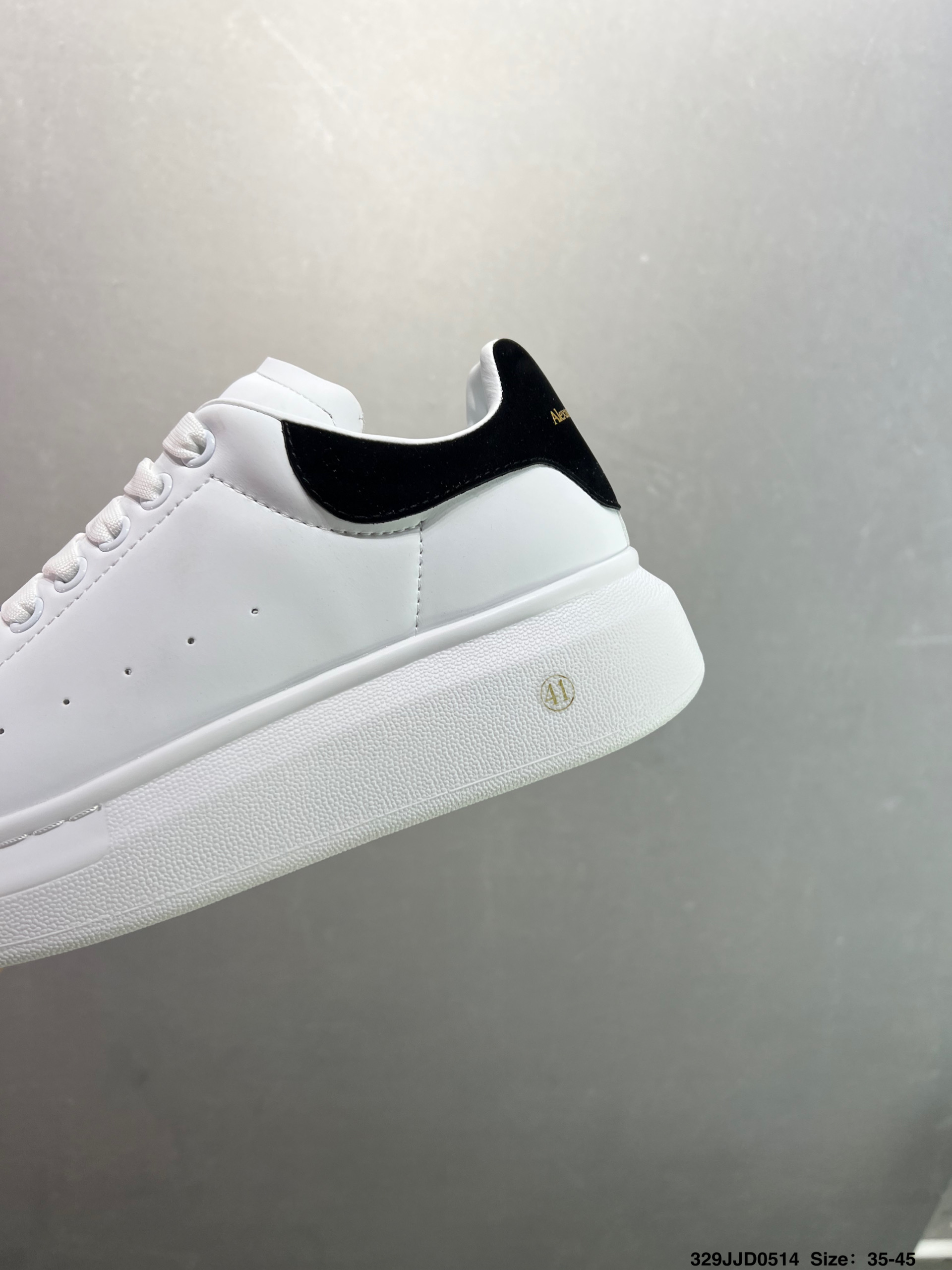 Alexander McQueen Oversized White Leather Sneakers - Iconic & Stylish 7 i1747147676048 4016 0 5