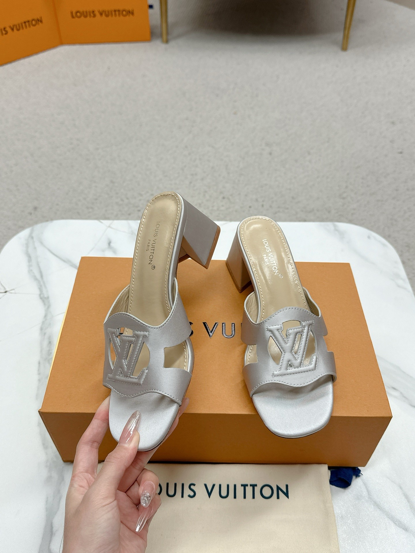 Title: Louis Vuitton 648 Heel Sandals Review Summary: Review of top version Louis Vuitton 648 heel sandals, praising their quality and style.