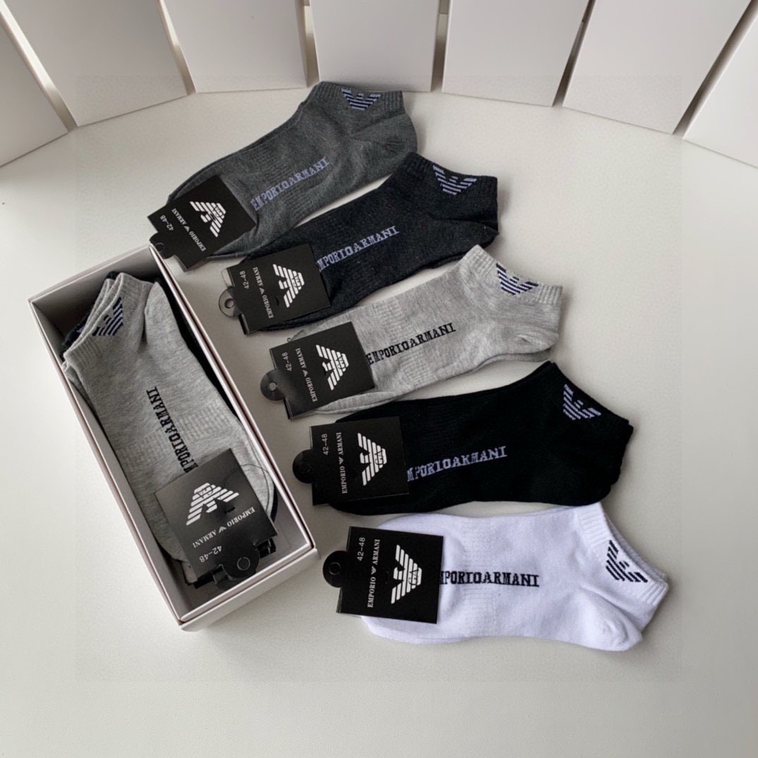 New Stockings Stacked: A Box of Five Pairs for Amani on Counter. - 图片 5