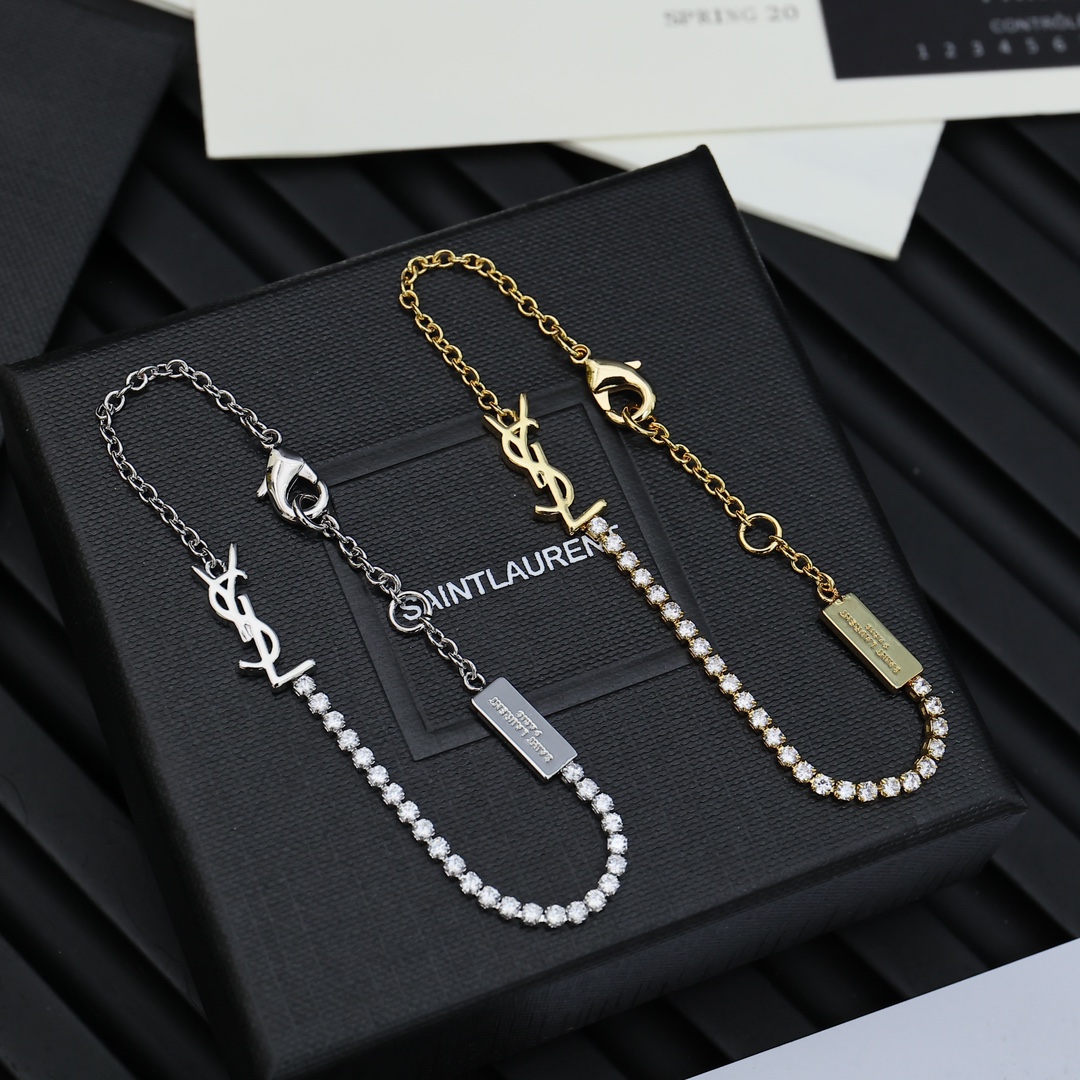 Title: YSL St. Roland: Elegant Luxury Fashion Brand by Yves Saint Laurent Since 1961. - 图片 1